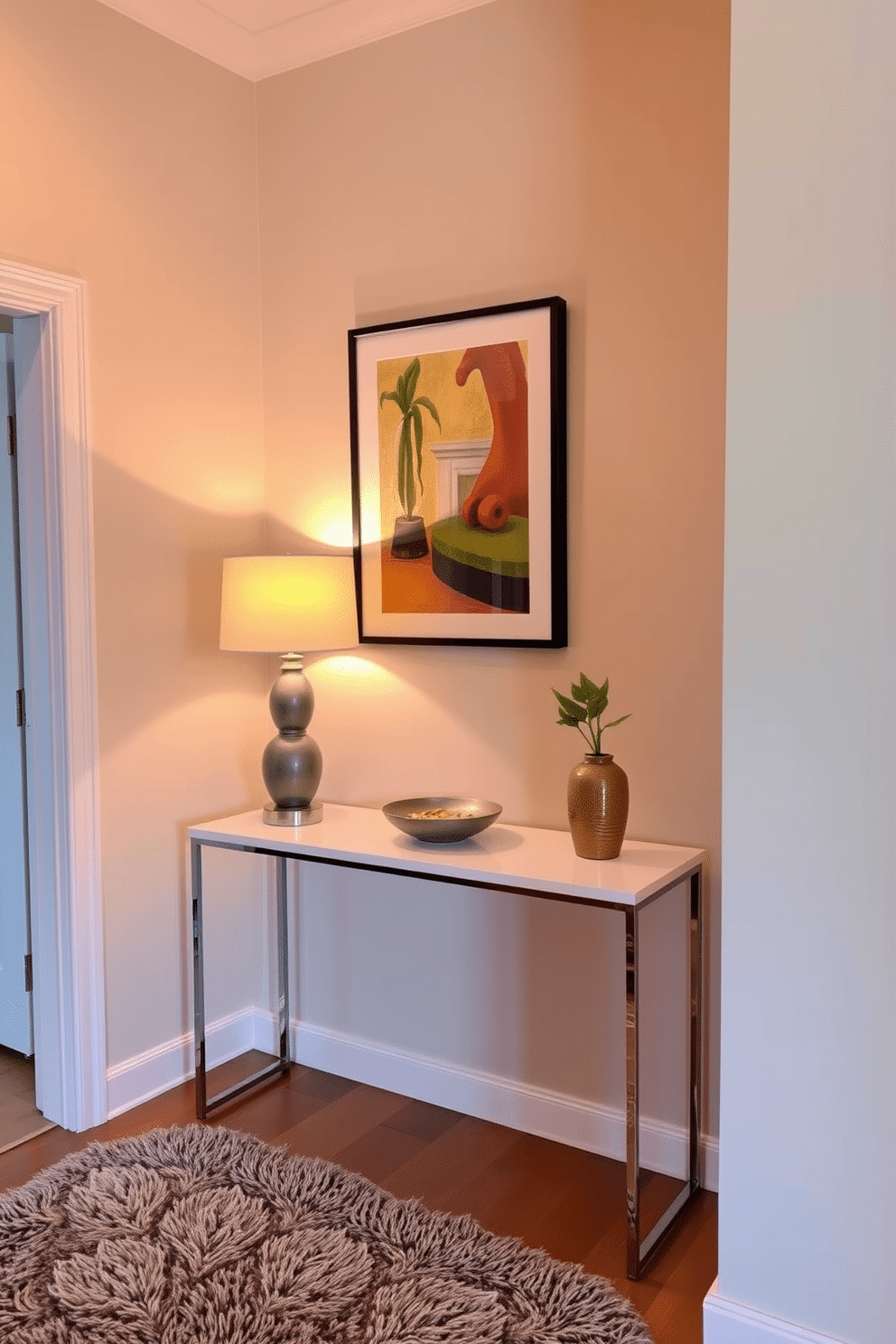 Framed artwork adorns the walls of a stylish apartment entryway, creating an inviting atmosphere. A sleek console table with a modern lamp sits beneath the artwork, complemented by a decorative bowl for keys and small items. The entryway features a warm color palette, with soft lighting that highlights the artwork's vibrant colors. A plush area rug anchors the space, providing a cozy feel as guests enter the home.