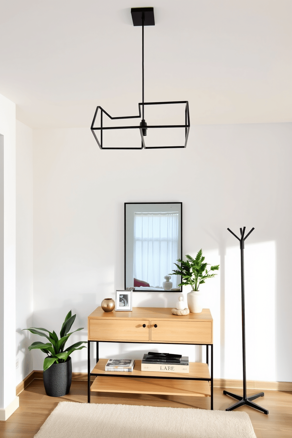 A sleek modern lighting fixture hangs gracefully from the ceiling, featuring a minimalist design with geometric shapes and a matte black finish. Below, a stylish console table in a light wood tone complements the fixture, adorned with decorative items and a small potted plant. The entryway is designed with a focus on functionality and aesthetics, showcasing a large mirror with a thin frame that reflects natural light. A soft area rug in neutral tones anchors the space, while a contemporary coat rack adds a practical yet chic touch to the overall design.