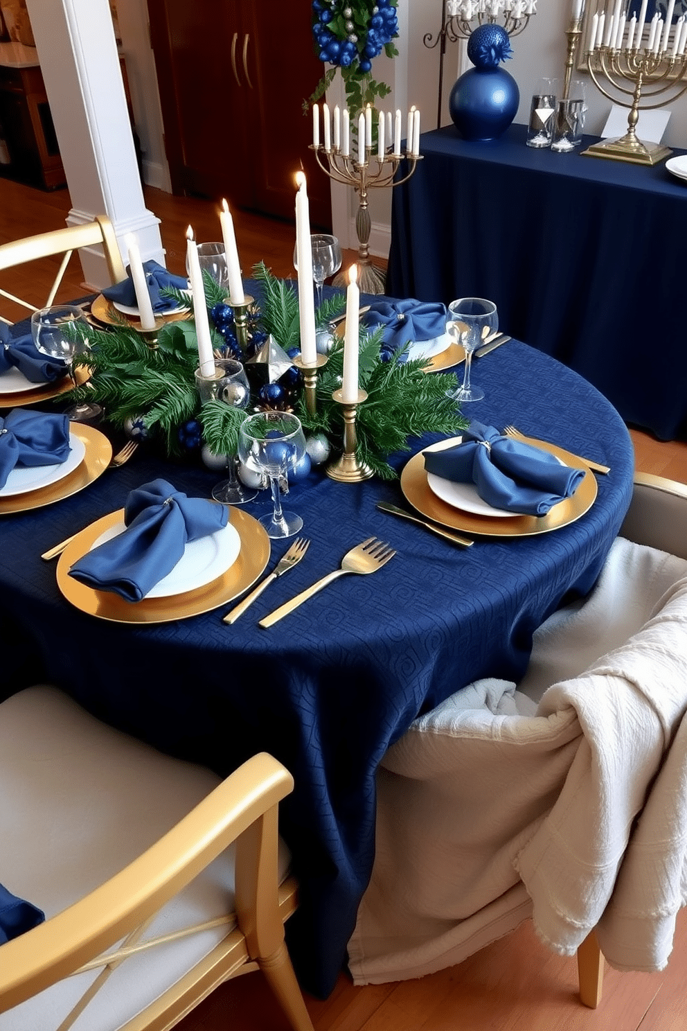 A beautifully set dining table features a rich, textured tablecloth in deep navy blue, complemented by elegant gold dinnerware. Soft, shimmering fabric napkins are artfully folded at each place setting, while a centerpiece of seasonal greenery and candles adds warmth to the atmosphere. For a festive Hanukkah celebration, the apartment is adorned with blue and silver accents, including decorative menorahs and star-shaped ornaments. Cozy throws in soft fabric are draped over chairs, enhancing the inviting ambiance for family gatherings.