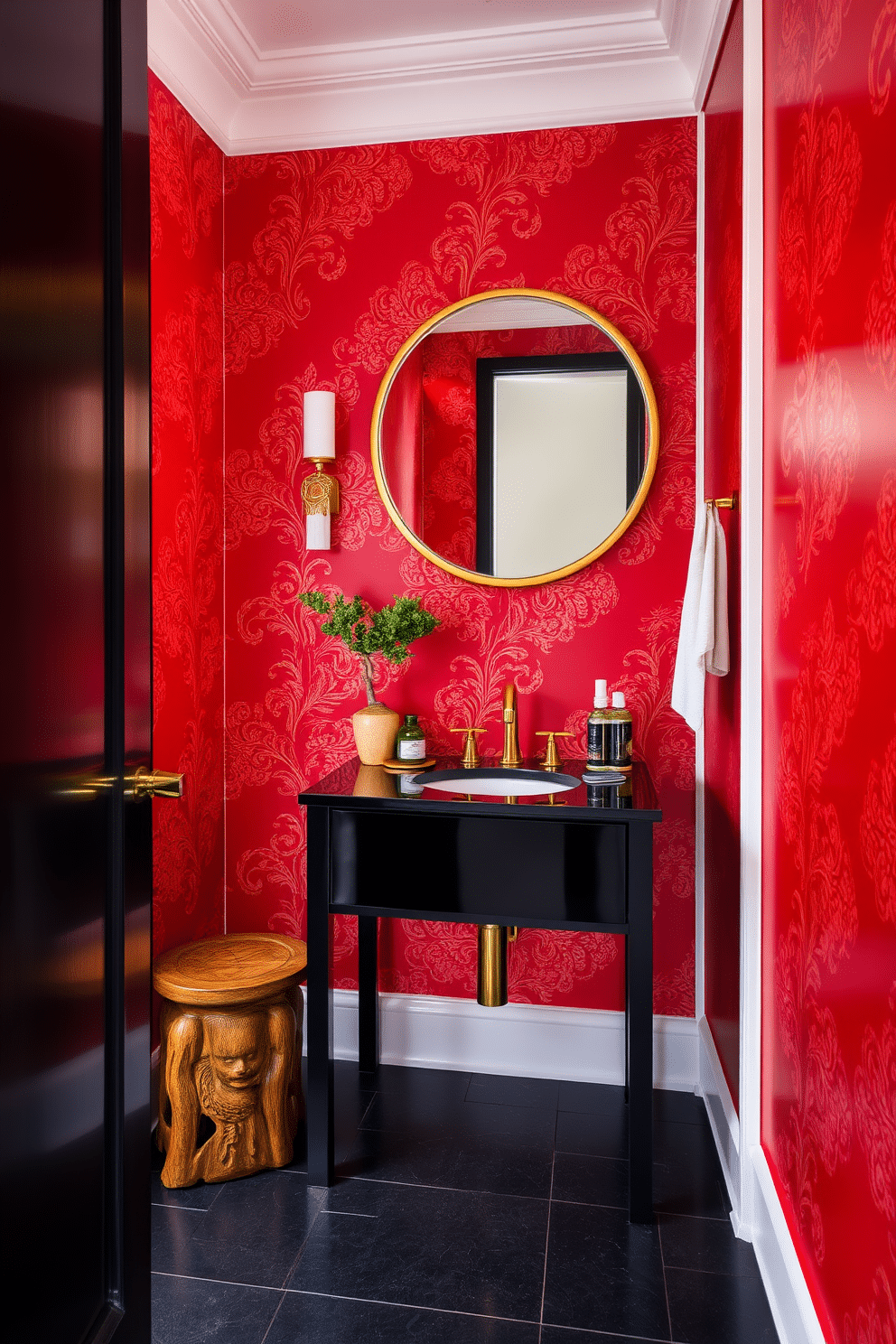 A vibrant Asian powder room featuring rich red walls adorned with intricate gold patterns. The space includes a sleek black vanity with a gold faucet and a round mirror framed in gold, creating a striking focal point. Decorative elements such as a carved wooden stool and a small bonsai tree add a touch of nature and elegance. The floor is covered with dark tiles, contrasting beautifully with the bold color scheme and enhancing the overall luxurious feel.