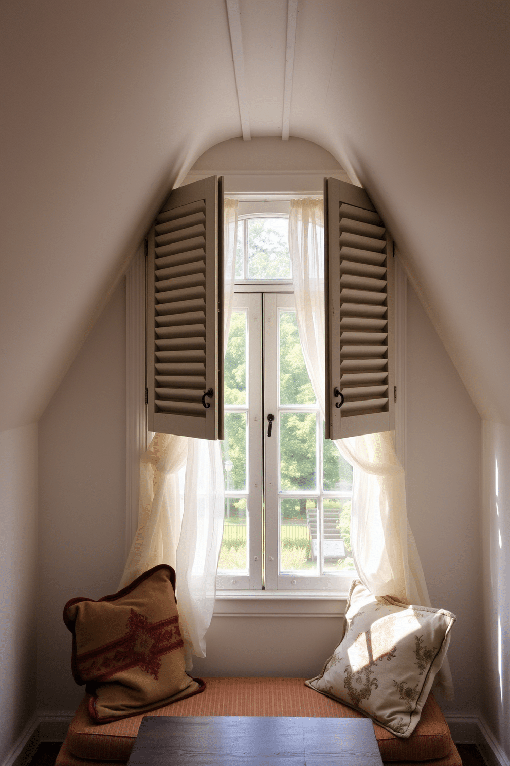 A cozy attic space features vintage wooden shutters that complement the classic design. The shutters are painted in a soft white, allowing natural light to filter through while adding a touch of elegance to the room. The attic window is framed by flowing sheer curtains that enhance the vintage aesthetic. Beneath the window, a plush seating area invites relaxation, adorned with antique cushions and a rustic wooden table.