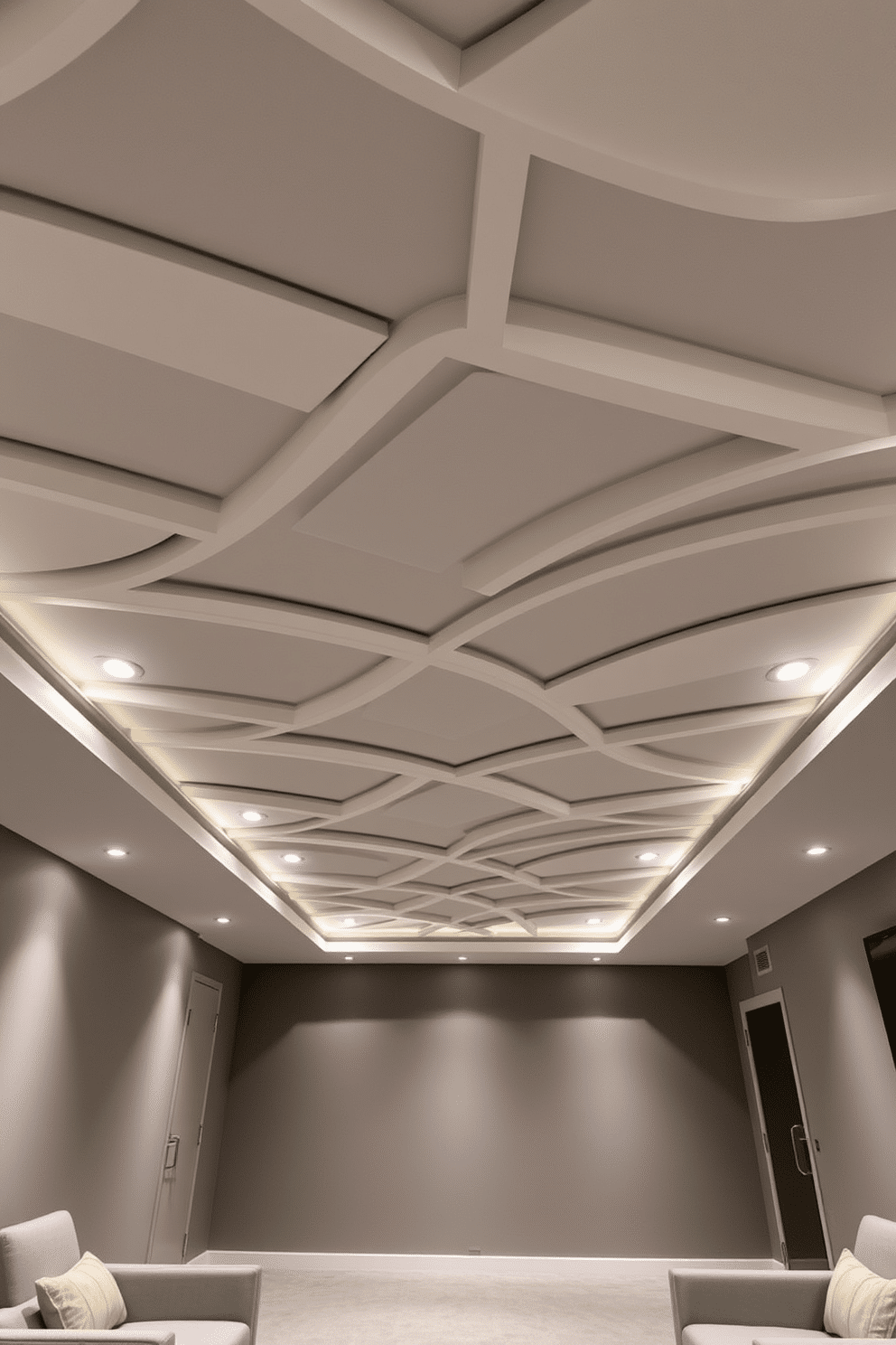 A contemporary basement features a striking ceiling adorned with geometric patterns that create a visually dynamic effect. The interplay of sharp angles and soft curves adds depth, while recessed lighting highlights the intricate design. The color palette consists of muted greys and whites, enhancing the modern aesthetic. Sleek, minimalist furniture complements the ceiling, creating a cohesive and inviting space perfect for relaxation or entertainment.