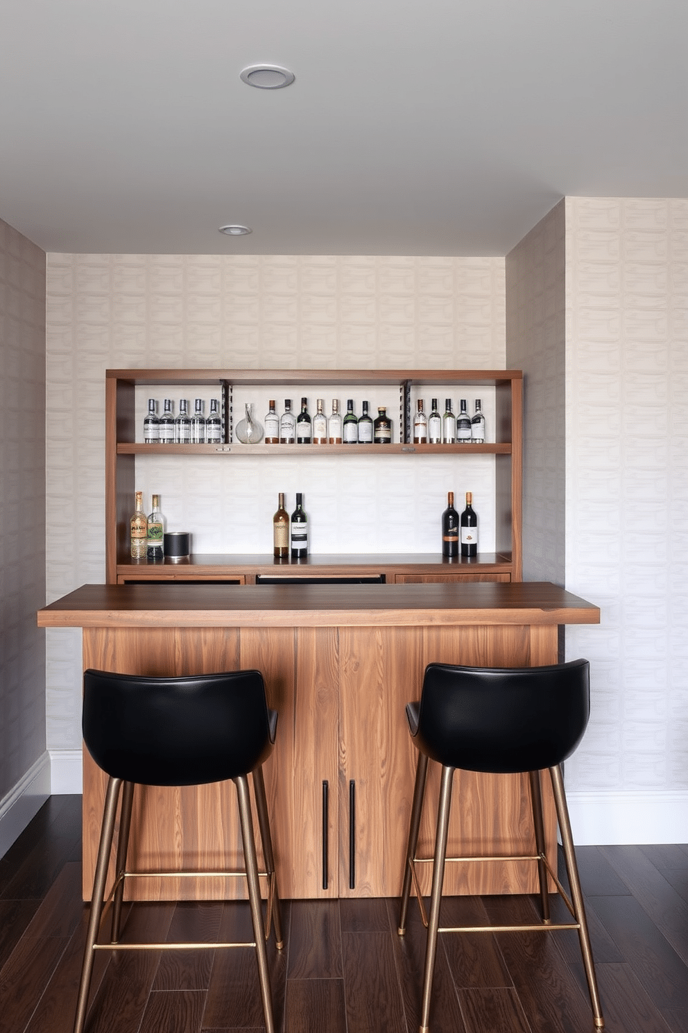 A chic basement dry bar features subtle wallpaper with a delicate geometric pattern that adds depth and texture to the space. The bar itself is crafted from rich walnut wood, complemented by sleek black bar stools with gold accents for a touch of elegance.