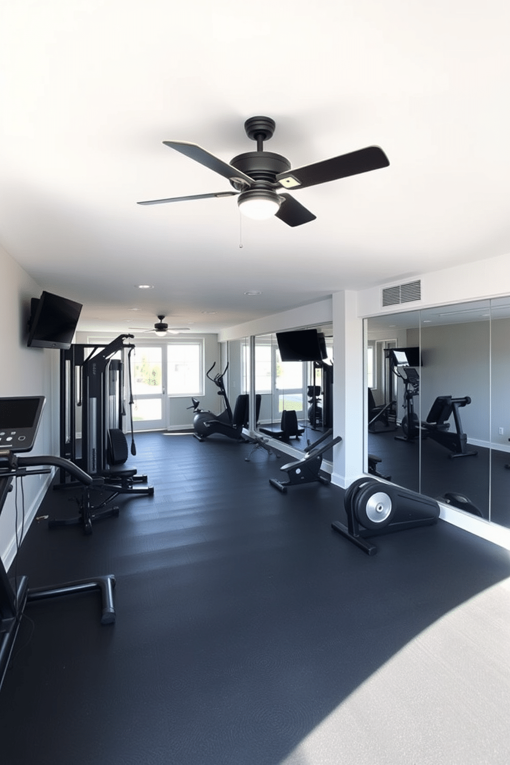 A modern basement gym featuring a sleek design with a ceiling fan for optimal ventilation. The space includes rubber flooring, mirrored walls, and a variety of exercise equipment, creating an inviting atmosphere for workouts.