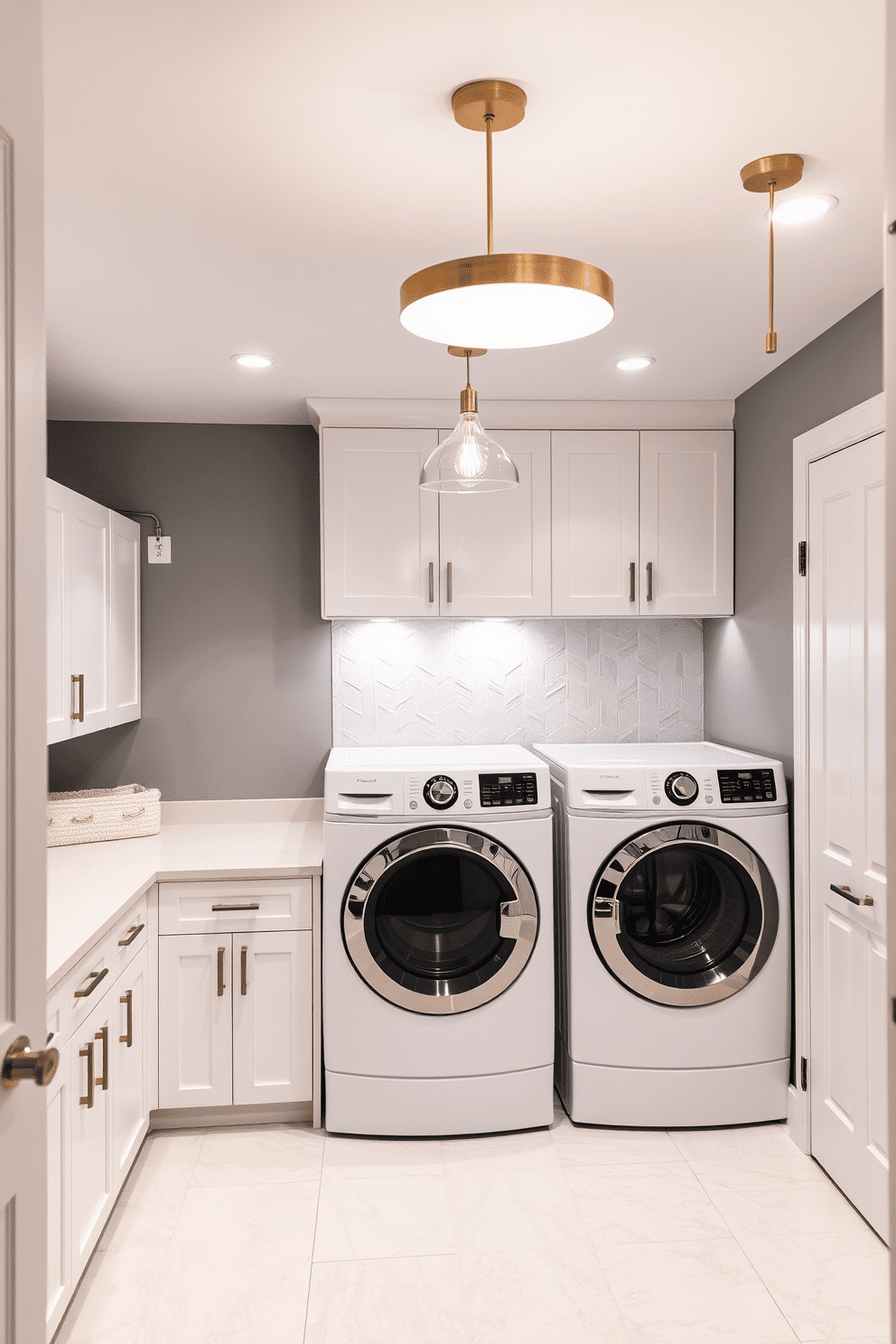 A sleek basement laundry room featuring modern lighting fixtures that create a bright and inviting ambiance. The space includes a large countertop for folding clothes, with stylish pendant lights hanging above to illuminate the area effectively. The walls are painted in a soft gray, complemented by white cabinetry that provides ample storage. A contemporary washer and dryer are seamlessly integrated into the design, with a chic backsplash adding a touch of elegance behind them.