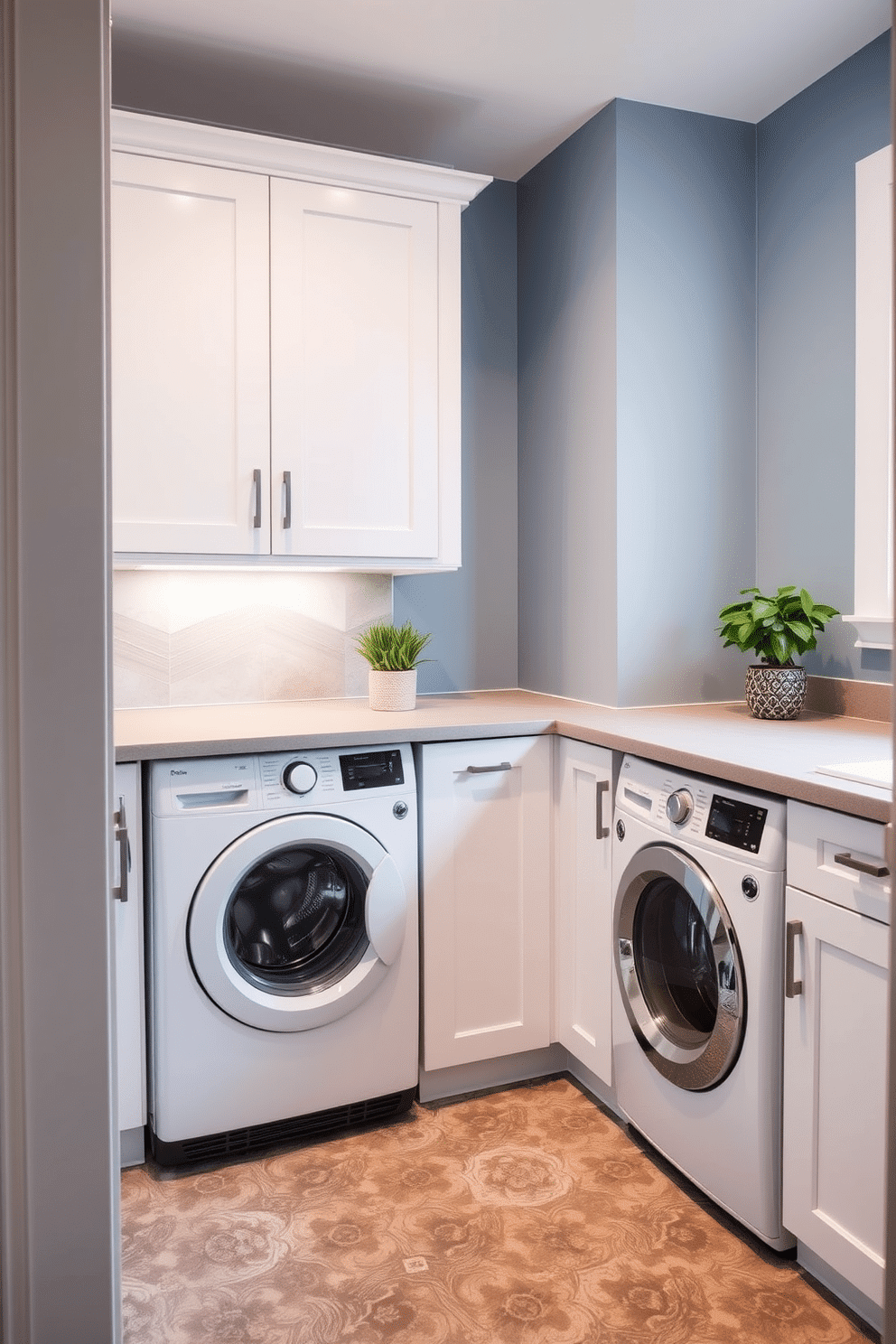 A stylish laundry room that doubles as a functional space for household tasks. The design features a sleek, white cabinetry with a built-in washer and dryer, complemented by a light gray countertop for folding clothes. A small potted plant sits on the countertop, adding a touch of freshness and vibrancy to the room. The walls are painted in a soft blue hue, and the floor is adorned with durable, patterned tiles for both practicality and aesthetic appeal.