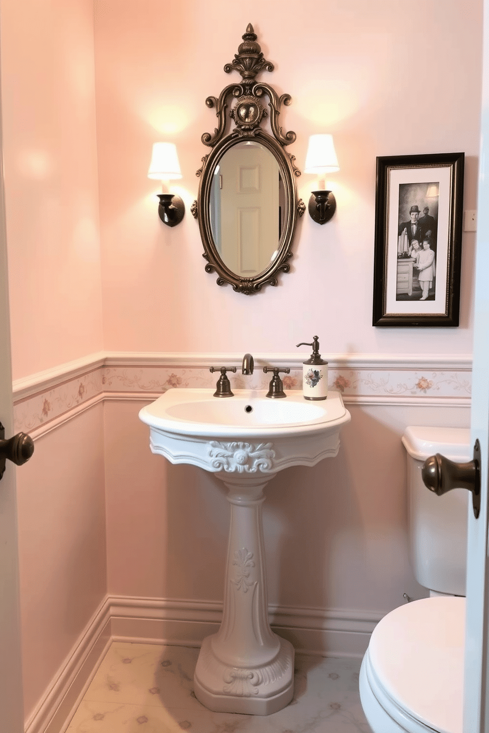 A vintage-inspired pedestal sink serves as the centerpiece of this elegant bathroom powder room. The sink is adorned with intricate porcelain detailing, surrounded by soft, ambient lighting that highlights its classic design. The walls are painted in a soft pastel hue, complemented by a delicate floral wallpaper border. A small, ornate mirror hangs above the sink, framed in antique brass, adding a touch of charm and sophistication to the space.