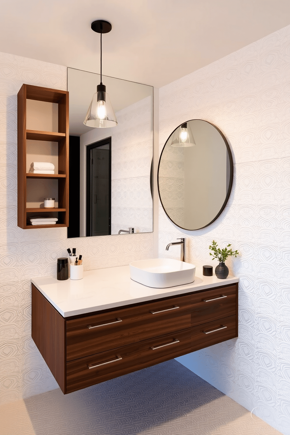 Chic floating vanity with modern lighting. The vanity is crafted from sleek walnut wood, featuring a white quartz countertop with an integrated sink. Above the vanity, a pair of minimalist pendant lights cast a warm glow, enhancing the contemporary aesthetic. The walls are adorned with textured white tiles, while a large round mirror reflects the stylish decor.