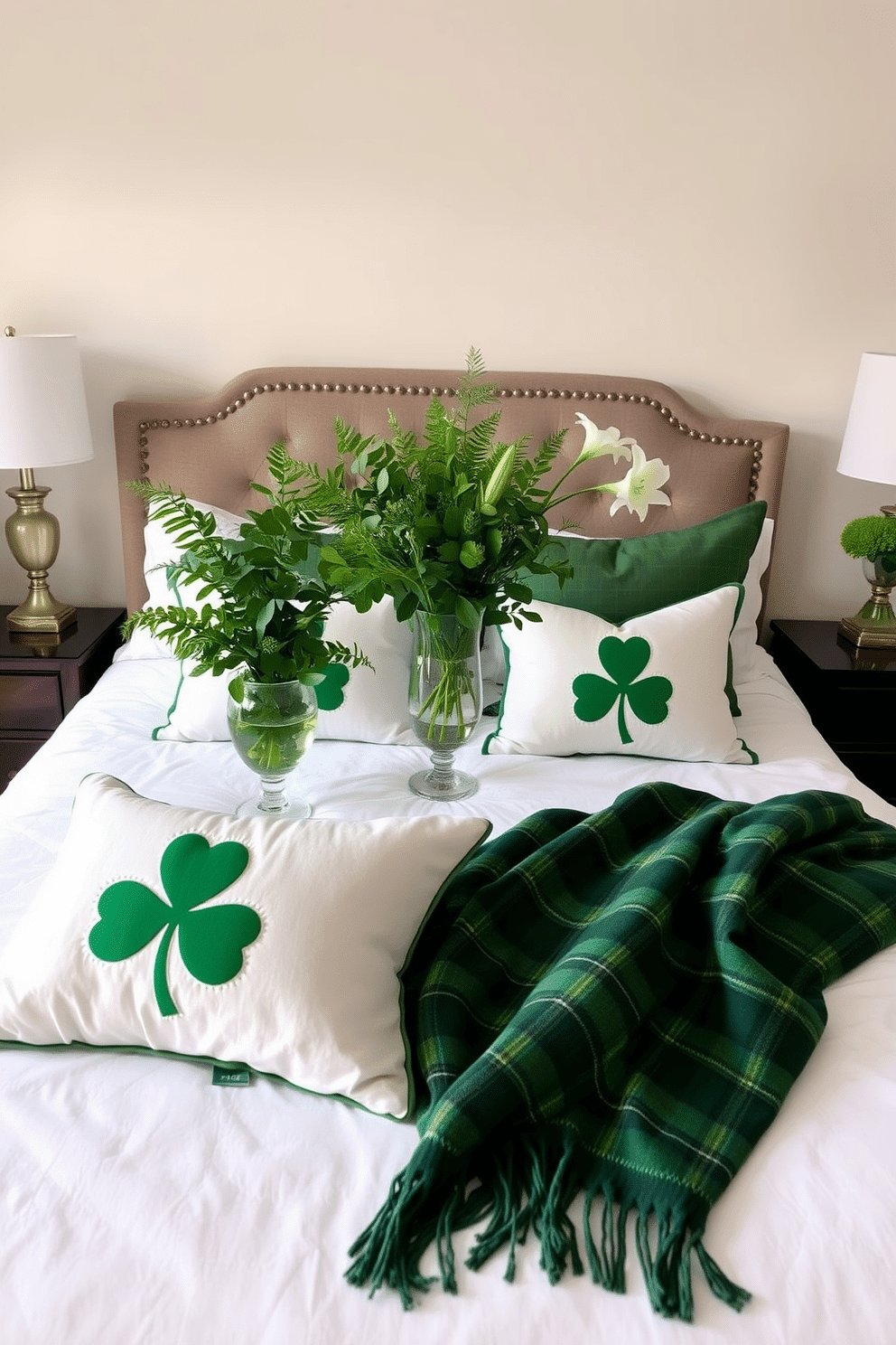 A serene bedroom setting adorned with lush green floral arrangements. The arrangements feature a mix of ferns, eucalyptus, and white lilies in elegant vases placed on nightstands. For St. Patrick's Day, the room is decorated with subtle touches of green and gold. Shamrock-themed throw pillows and a green plaid blanket drape over the bed, creating a festive yet sophisticated atmosphere.