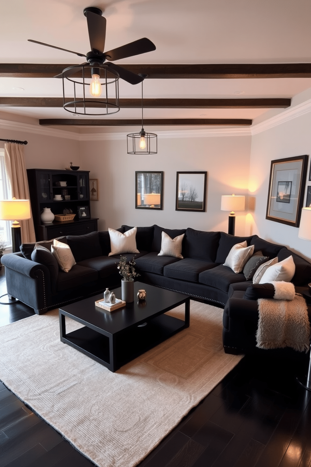 A cozy family room designed with a blend of modern and traditional elements. The space features a large black sectional sofa adorned with plush throw pillows, complemented by a sleek black coffee table at its center. Warm lighting fixtures, such as stylish pendant lights and table lamps, illuminate the room, creating a soft ambiance. A large area rug in neutral tones adds warmth to the black hardwood floor, while framed artwork enhances the walls with pops of color.