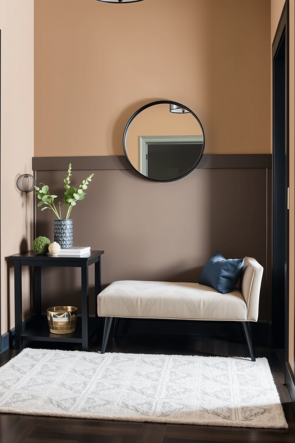 A warm and inviting foyer featuring rich black wood tones that create a cozy atmosphere. The space is adorned with a stylish bench upholstered in soft fabric, complemented by a large round mirror with a black frame hanging above it. To the left, a console table made of black-stained wood showcases decorative items and a small potted plant. The walls are painted in a warm beige hue, enhancing the cozy feel, while a plush area rug with subtle patterns lies beneath the bench, adding texture to the space.