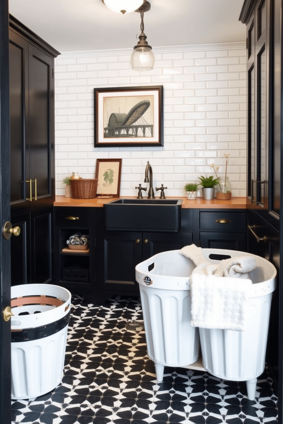 A vintage-inspired black laundry room features sleek black cabinetry with brass hardware, providing a classic touch. The walls are adorned with white subway tiles, while the floor showcases a patterned black-and-white tile that adds character. In the center, a farmhouse-style sink sits atop a distressed wooden countertop, complemented by an antique-style faucet. Vintage laundry baskets and decorative elements like framed art and potted plants enhance the room's charm and functionality.