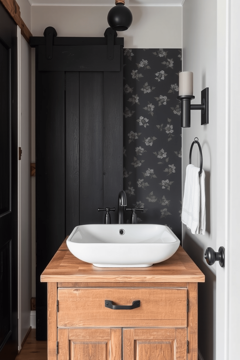 A rustic black barn door serves as a striking entryway feature, inviting guests into a space that balances charm and functionality. The door is framed by reclaimed wood accents, enhancing the warm, inviting atmosphere of the home. In the black powder room, bold fixtures contrast with soft, textured elements to create a sophisticated yet cozy ambiance. A vintage-style sink with a matte black faucet sits atop a distressed wooden vanity, complemented by dark, moody wallpaper adorned with subtle floral patterns.