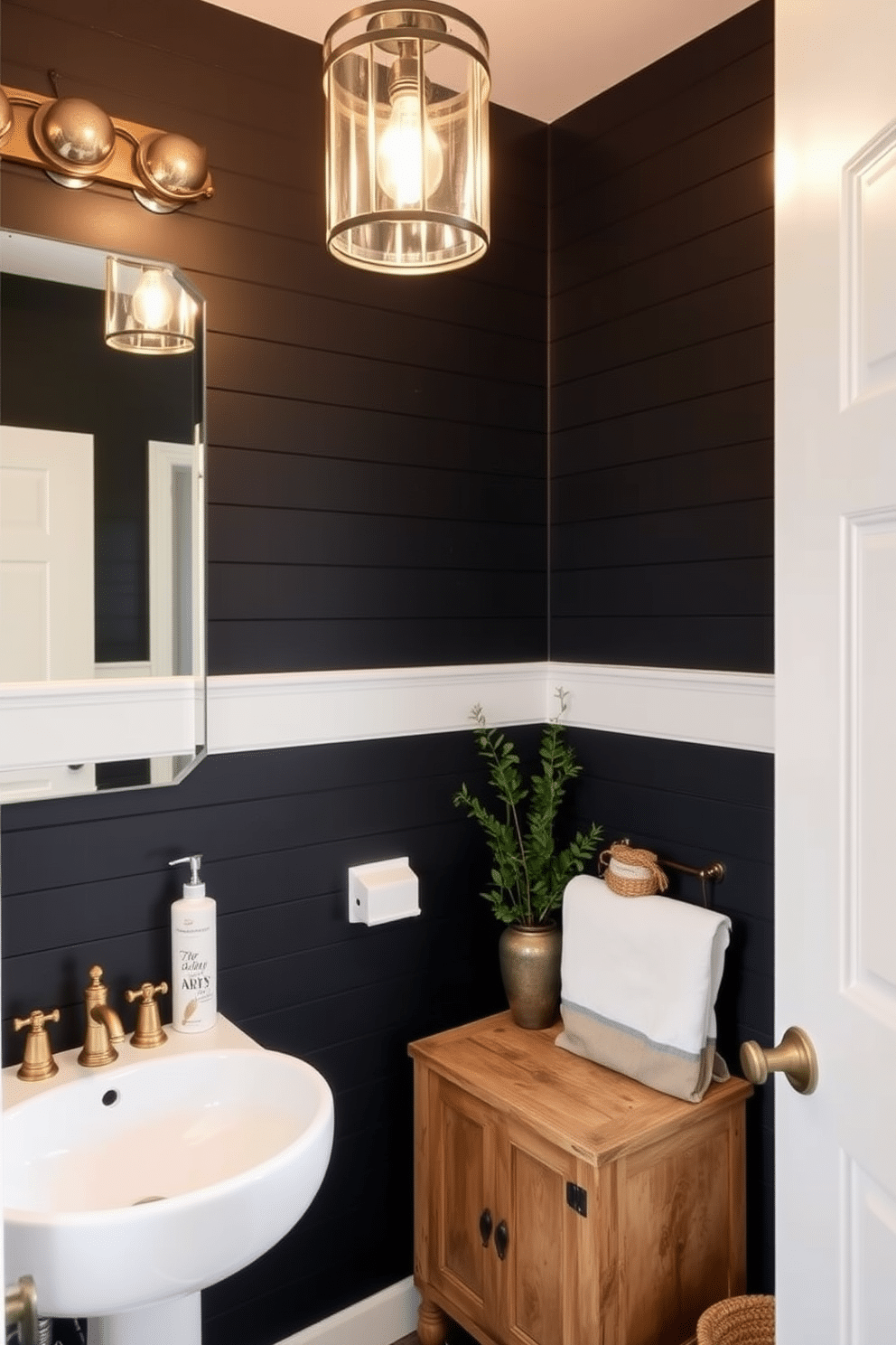 A stunning powder room featuring black shiplap walls that exude rustic charm. The space includes a vintage wooden vanity with a distressed finish, topped with a sleek white vessel sink and elegant brass fixtures. Soft ambient lighting is provided by a stylish chandelier, casting a warm glow over the room. Accents of natural greenery and a woven basket add a touch of freshness and texture to the overall design.