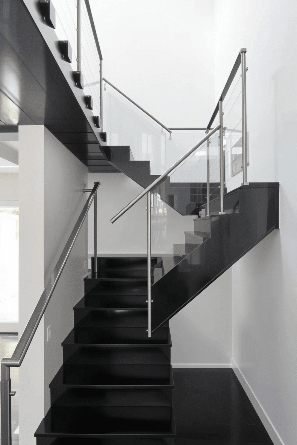 A striking black staircase features a sleek glass landing that enhances the modern aesthetic of the space. The staircase is adorned with minimalist metal railings, creating a seamless flow between each step and the surrounding area. The glass landing provides an airy feel, allowing natural light to filter through and illuminate the staircase. Below, the polished black steps contrast beautifully against the light-colored walls, making a bold statement in the entryway.