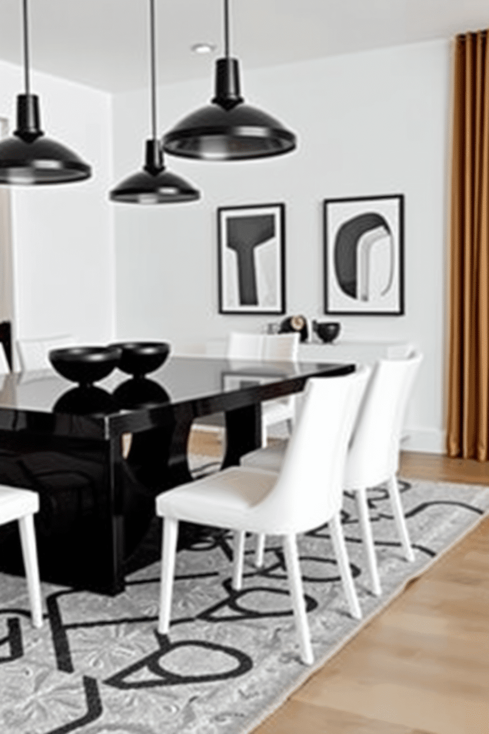 A contemporary dining room featuring a sleek black table surrounded by elegant white chairs. Above the table, striking black light fixtures hang, casting a warm glow over the space. The walls are painted in a crisp white, creating a clean backdrop for bold black and white art pieces. A stylish rug with geometric patterns anchors the room, adding texture and contrast to the overall design.