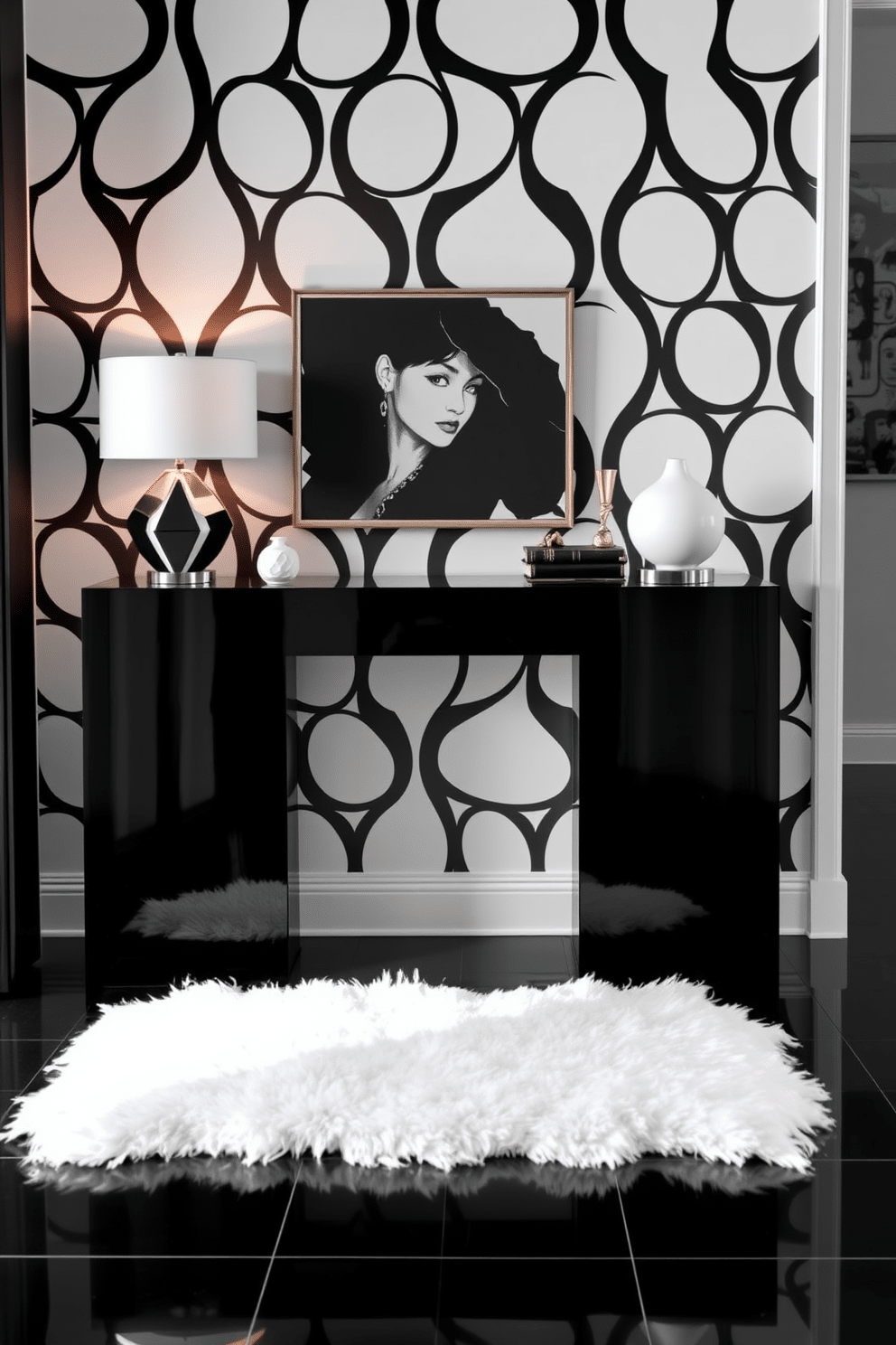 A sleek monochrome console table stands against the wall, featuring a high-gloss black finish that reflects the light. Stylish accents such as a geometric lamp and a minimalist sculpture adorn the table, enhancing its modern appeal. The foyer is designed in a striking black and white palette, with bold graphic wallpaper creating a dramatic backdrop. A plush white rug lies beneath the console, providing warmth and contrast to the polished black floor tiles.