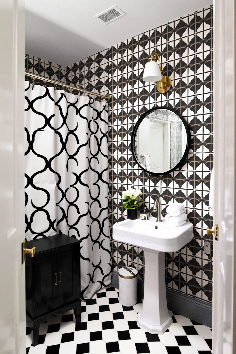 A chic powder room featuring a graphic black and white shower curtain that serves as a bold focal point. The walls are adorned with geometric black and white wallpaper, complemented by a sleek pedestal sink and a round mirror with a black frame. The floor is covered in black and white checkered tiles, adding a touch of classic elegance. A stylish black cabinet provides storage, while fresh white towels and a small potted plant add a pop of color to the minimalist design.