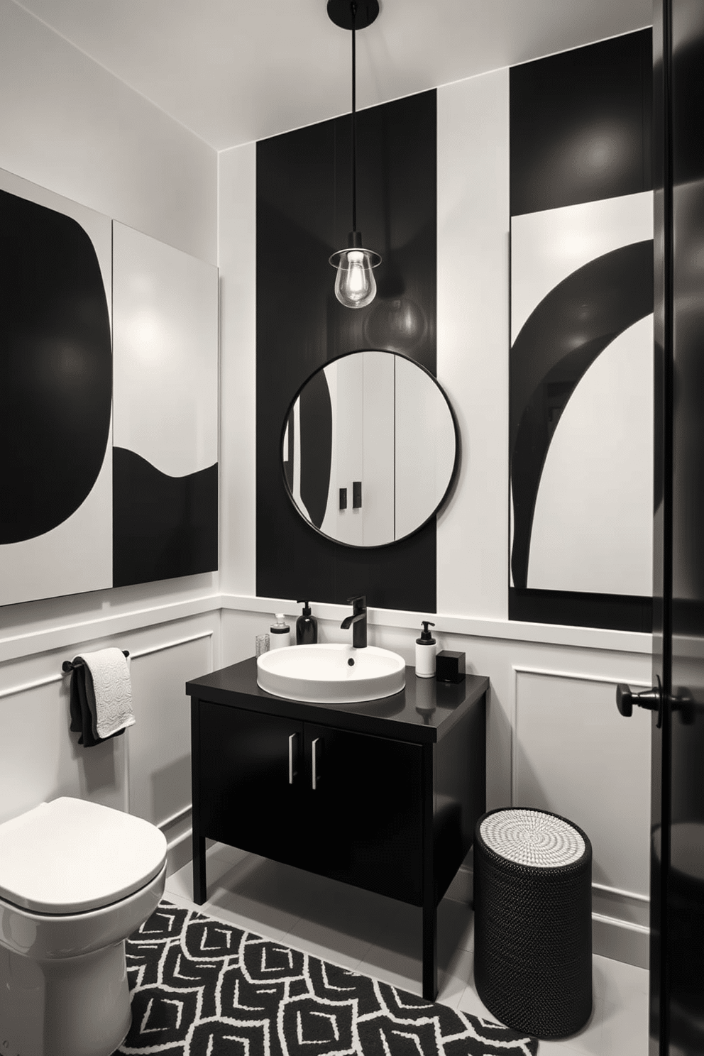 A sleek powder room features a striking black and white color palette, with walls adorned by large contemporary monochrome artworks that create a bold focal point. The space includes a minimalist black vanity with a white sink, complemented by a geometric patterned rug that adds texture to the floor. Elegant lighting fixtures hang from the ceiling, casting a warm glow over the room, while a round mirror with a thin black frame reflects the artistic elements. To enhance the modern aesthetic, accessories in varying shades of black and white are tastefully arranged on the countertop, creating a cohesive and stylish look.