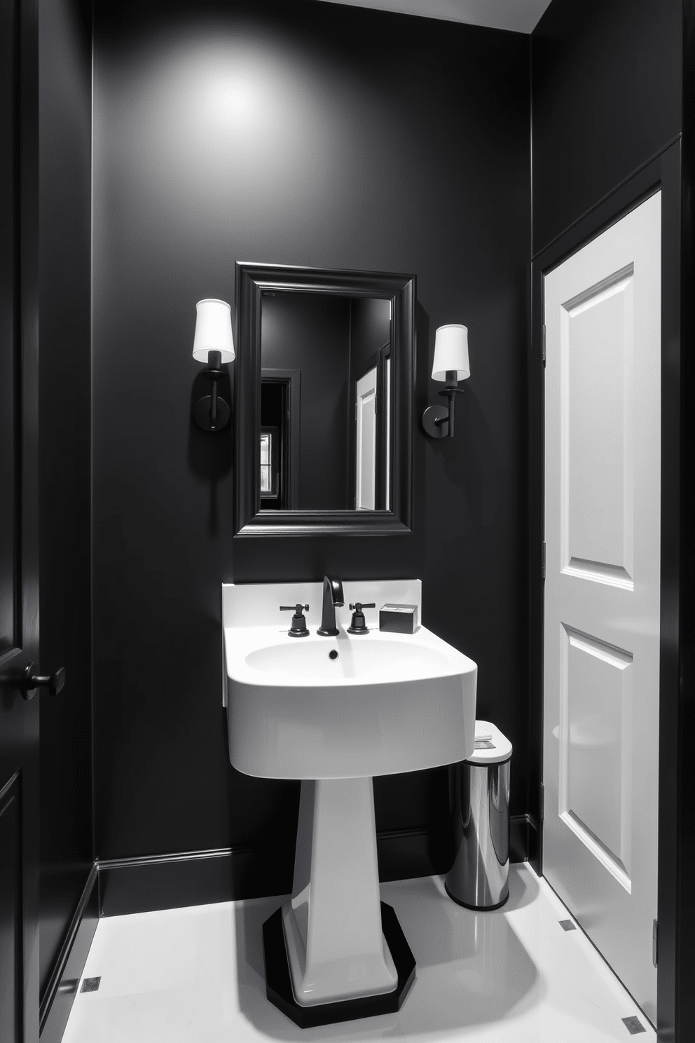 A striking powder room design features a bold black and white color scheme. The walls are painted a deep matte black, while the floor showcases glossy white tiles arranged in a geometric pattern. A sleek white pedestal sink is complemented by a black framed mirror above it, creating a dramatic focal point. Elegant black sconces with white shades flank the mirror, providing soft lighting that enhances the sophisticated atmosphere.