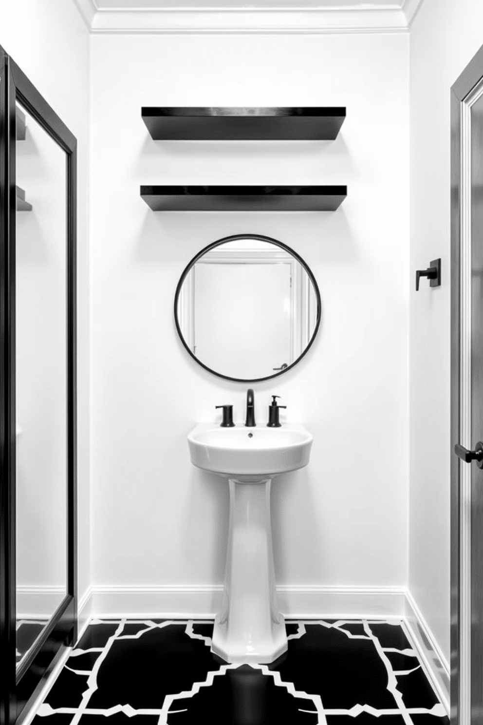 Sleek floating shelves in a black finish are mounted on the wall, creating a modern and minimalist aesthetic. Below the shelves, a stylish black and white powder room features a striking geometric tile pattern on the floor, complemented by a chic white pedestal sink. The walls are painted in a crisp white, providing a clean backdrop for the bold black accents. A round mirror with a thin black frame hangs above the sink, enhancing the room's contemporary feel while reflecting the elegant decor.