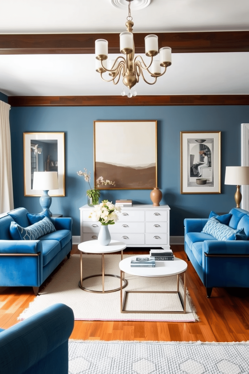 A cozy family room featuring vintage blue furniture with modern accents. A plush blue velvet sofa is paired with sleek, minimalist coffee tables and contemporary art on the walls. The room is illuminated by a stylish chandelier that blends vintage charm with modern design. Warm wood flooring complements the blue tones, while a textured area rug adds a layer of comfort and style.