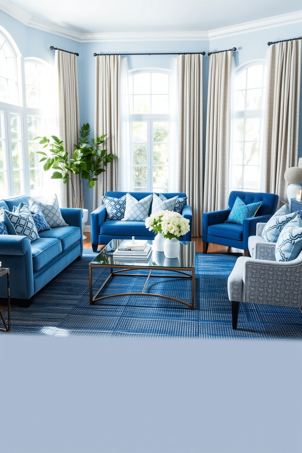 A cozy family room featuring layered shades of blue, with a plush velvet sofa adorned with patterned throw pillows. The walls are painted a soft sky blue, while a textured navy area rug anchors the space, complemented by a mix of woven and knitted fabric accents throughout. A stylish coffee table sits at the center, surrounded by a pair of upholstered armchairs in varying blue hues. Natural light floods the room through large windows draped with sheer curtains, creating a serene and inviting atmosphere perfect for relaxation.