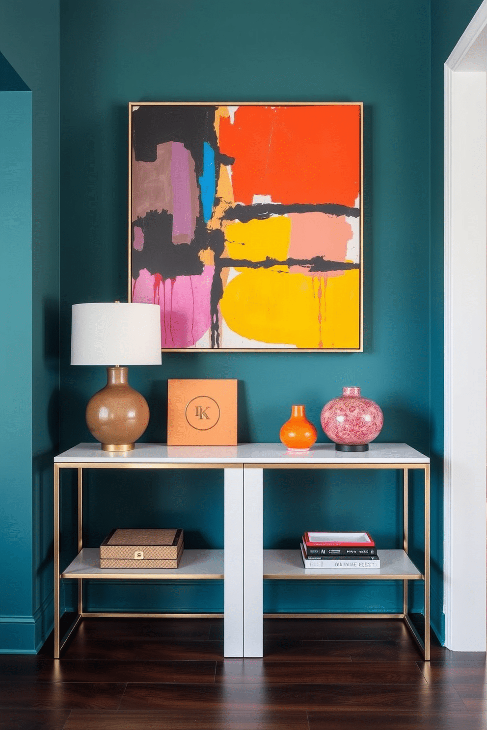 A rich teal foyer features a sleek console table adorned with contemporary art pieces that add vibrant pops of color. The walls are painted in a deep teal hue, creating a bold backdrop for a large abstract painting that commands attention.