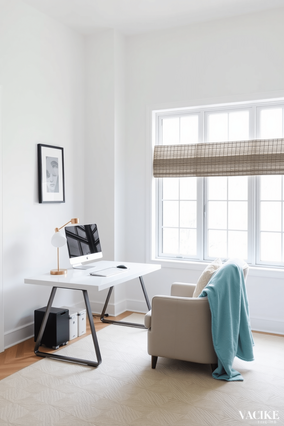 A cozy home office featuring a sleek desk with a minimalist design, complemented by a comfortable armchair draped with a sky blue throw blanket. The walls are painted in a soft white, and a large window allows natural light to flood the space, enhancing the calming atmosphere.