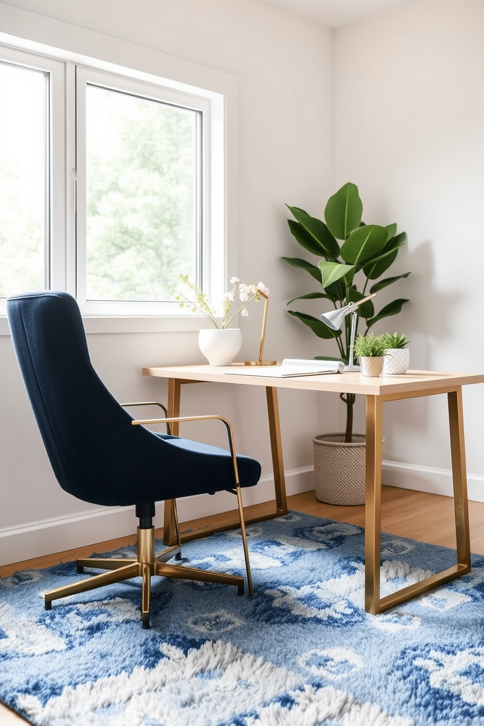 A modern home office featuring a dark blue office chair with elegant brass legs. The desk is a sleek, minimalist design in a light wood finish, complemented by a large window that allows natural light to flood the space. The walls are painted in a soft, neutral tone, creating a calming atmosphere. A plush area rug in shades of blue and white anchors the room, while decorative plants add a touch of greenery.