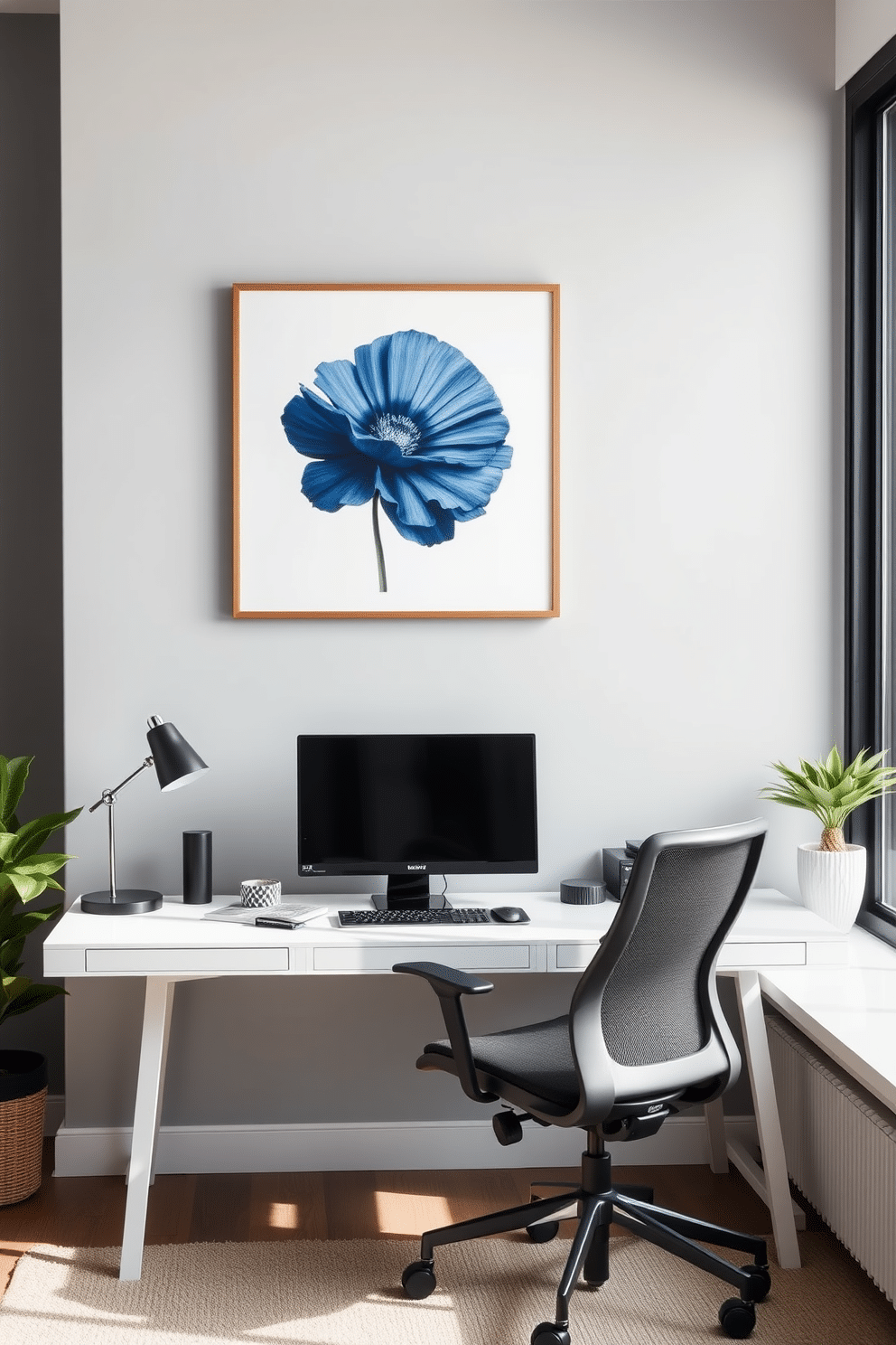 A serene home office with indigo wall art displayed in a sleek, minimalist frame. The workspace features a modern desk paired with a comfortable ergonomic chair, complemented by natural light streaming through a large window.