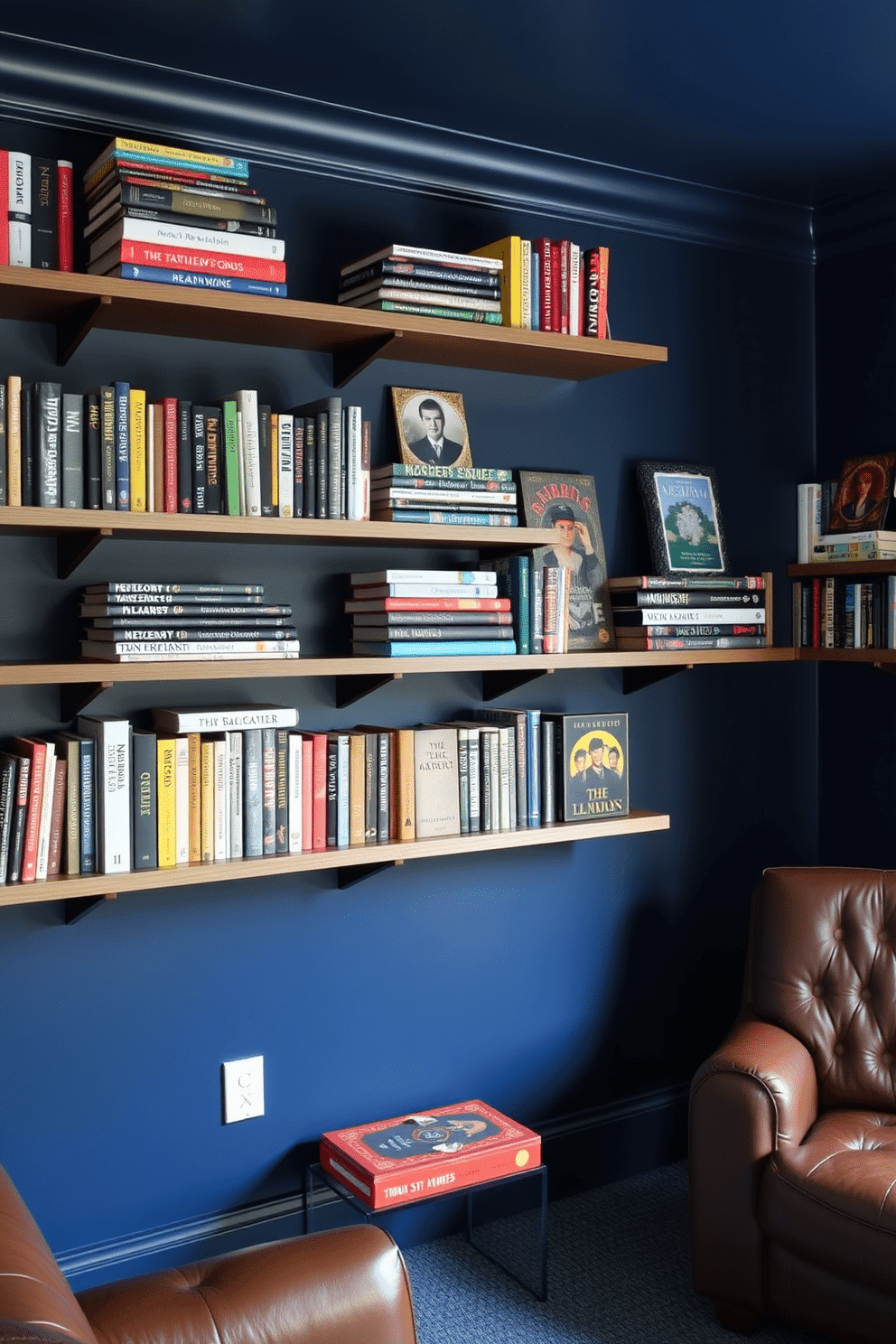 A modern man cave featuring wall-mounted shelves filled with an eclectic collection of books and board games. The walls are painted in a deep navy blue, complemented by comfortable leather seating and ambient lighting.