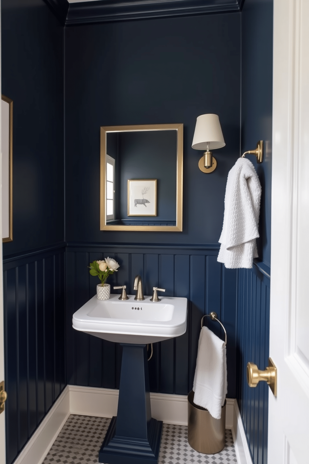 A chic powder room featuring navy blue wainscoting that adds a touch of elegance to the space. The white top seamlessly contrasts with the dark wood, creating a sophisticated and inviting atmosphere. The room is adorned with a stylish pedestal sink and a sleek mirror framed in brushed nickel. Soft lighting fixtures highlight the rich colors, while decorative accents like a small potted plant and luxurious hand towels complete the design.