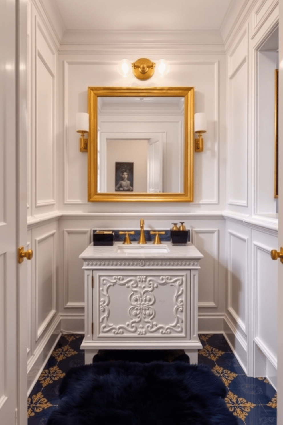 A stunning powder room features blue and gold patterned floor tiles that create a luxurious atmosphere. The walls are adorned with soft white paneling, and a sleek gold-framed mirror hangs above a modern white sink. A stylish vanity with intricate detailing complements the elegant color scheme, while gold fixtures add a touch of sophistication. A plush navy rug lies beneath the sink, enhancing the room's cozy yet opulent feel.