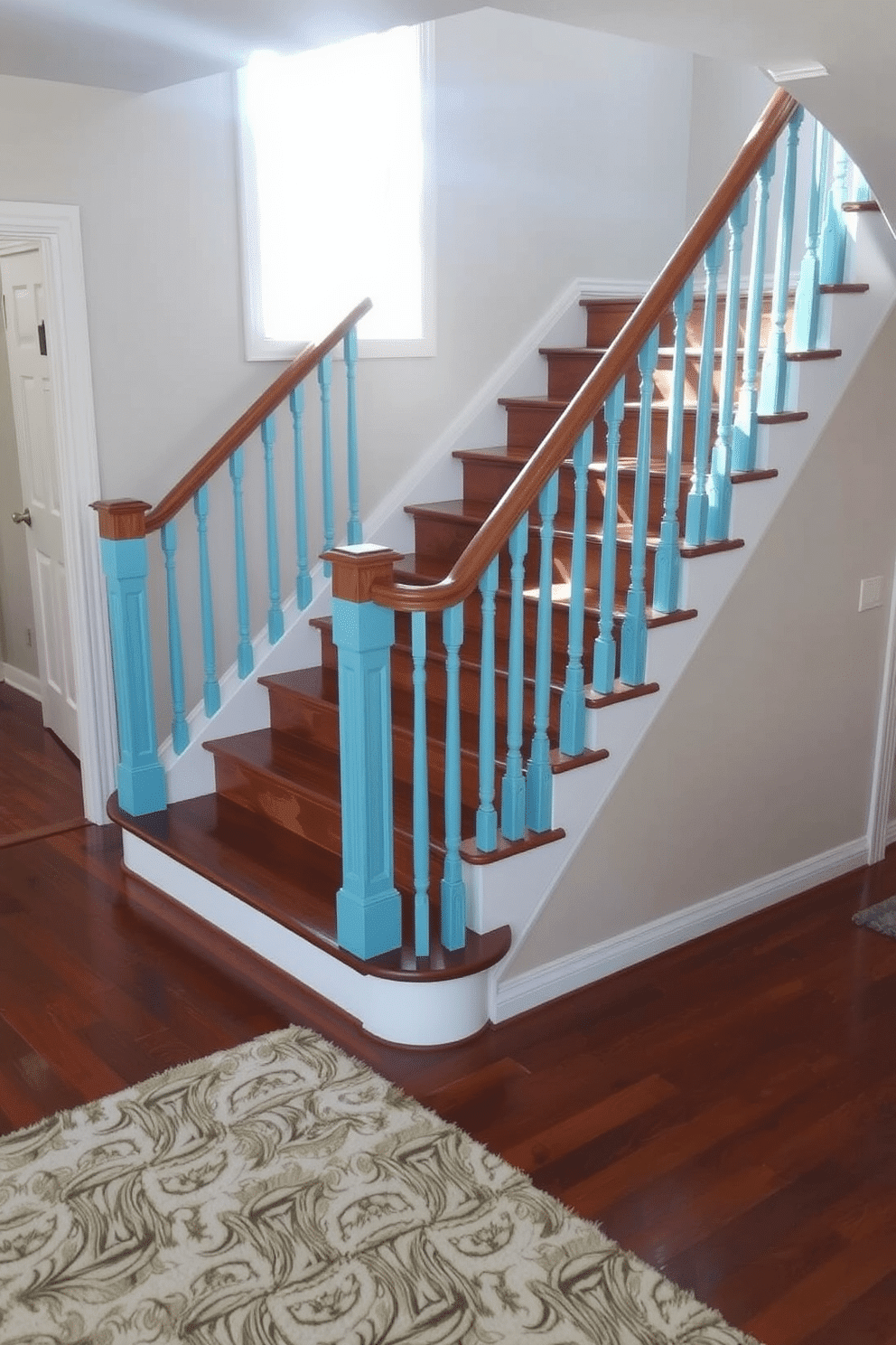 A stunning staircase features aqua blue painted balusters and handrails that add a vibrant touch to the space. The steps are crafted from rich hardwood, contrasting beautifully with the cheerful color of the railings. The staircase is illuminated by natural light streaming through a nearby window, enhancing the aqua blue hues. Below, a plush area rug in soft neutrals anchors the design, creating a welcoming atmosphere.