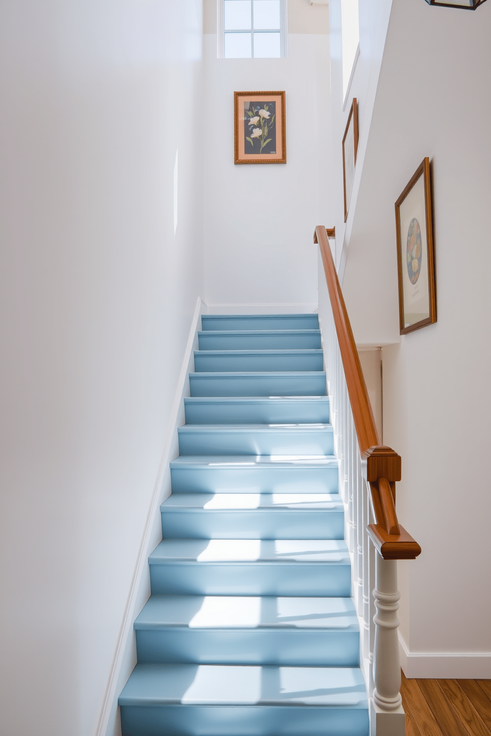 A stunning staircase features soft blue treads that provide a gentle contrast against the crisp white walls. Natural light floods the space, highlighting the elegant lines and inviting atmosphere of the staircase design. The handrail, crafted from polished wood, complements the blue treads beautifully, creating a harmonious look. Decorative wall art adds a personal touch, enhancing the overall aesthetic of the stairwell.