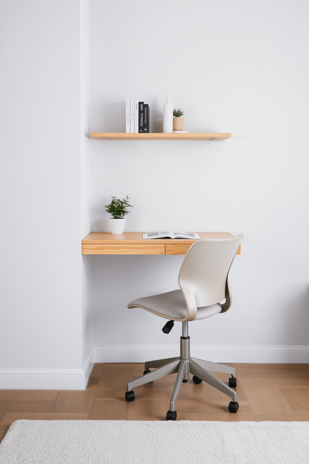 A small, compact desk is positioned against a light gray wall, maximizing the use of space while maintaining a clean aesthetic. The desk features a minimalist design with a natural wood finish, complemented by a sleek ergonomic chair in a soft fabric. Above the desk, a floating shelf holds a few decorative books and a small potted plant, adding a touch of greenery to the study area. The floor is covered with a cozy area rug in muted tones, creating a warm and inviting atmosphere for focused study sessions.