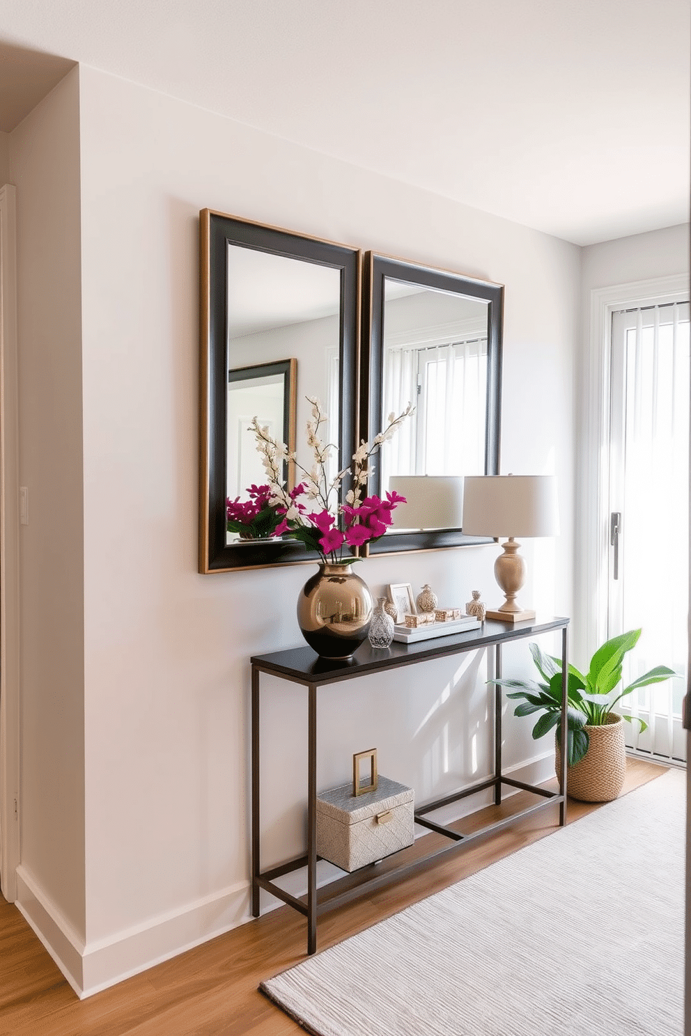 A stylish condo entryway features framed mirrors strategically placed to enhance natural light, reflecting the brightness throughout the space. The walls are painted in a soft, inviting hue, complemented by a sleek console table adorned with decorative accents and a vibrant potted plant.