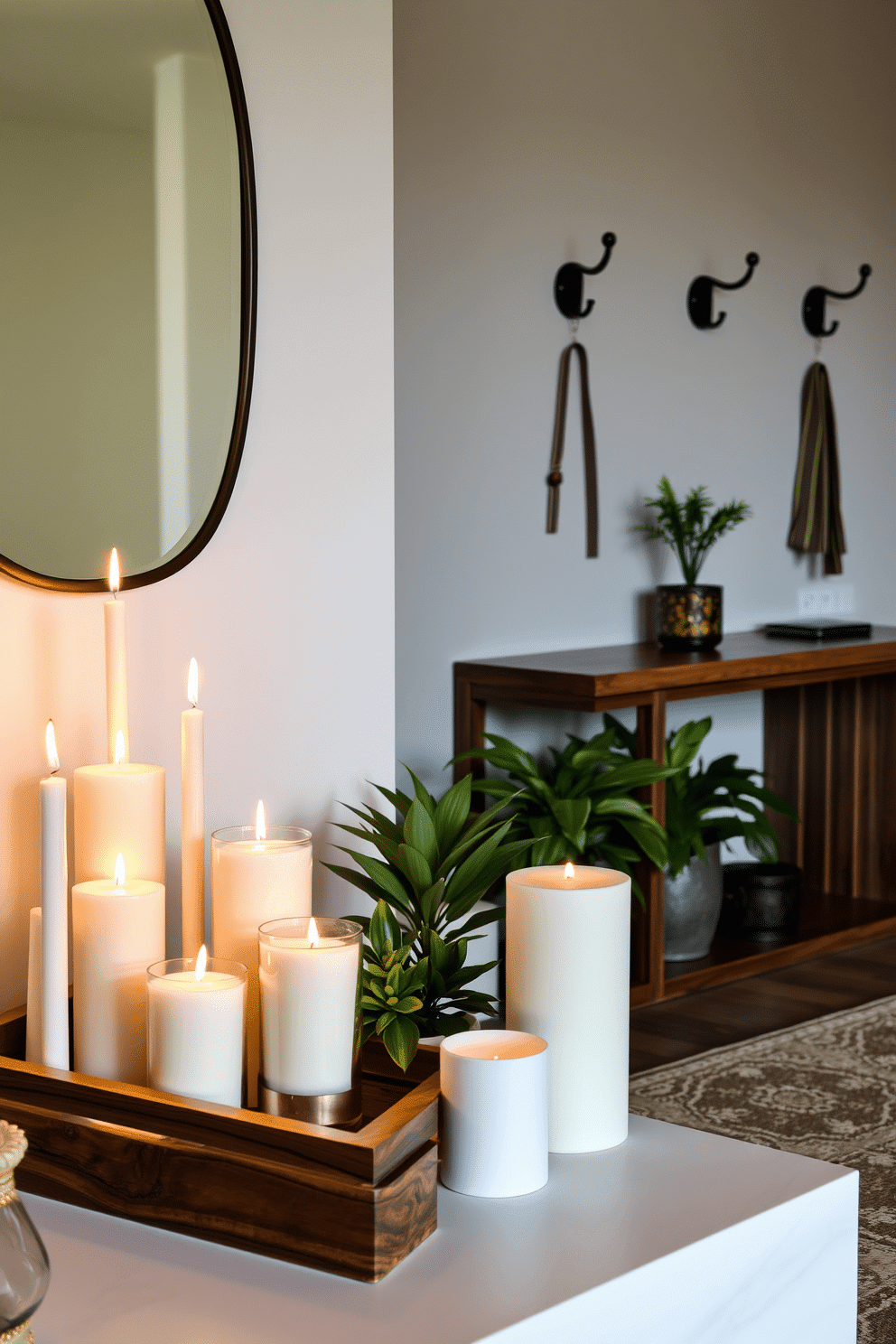 A beautiful candle display creates a warm atmosphere, featuring an assortment of candles in varying heights and sizes arranged on a rustic wooden tray. Soft flickering lights illuminate the space, complemented by lush greenery in elegant pots nearby. The condo entryway is designed with a sleek console table in rich walnut, adorned with a statement mirror above it. A stylish rug in muted tones welcomes guests, while decorative hooks on the wall provide a functional yet chic touch for coats and bags.