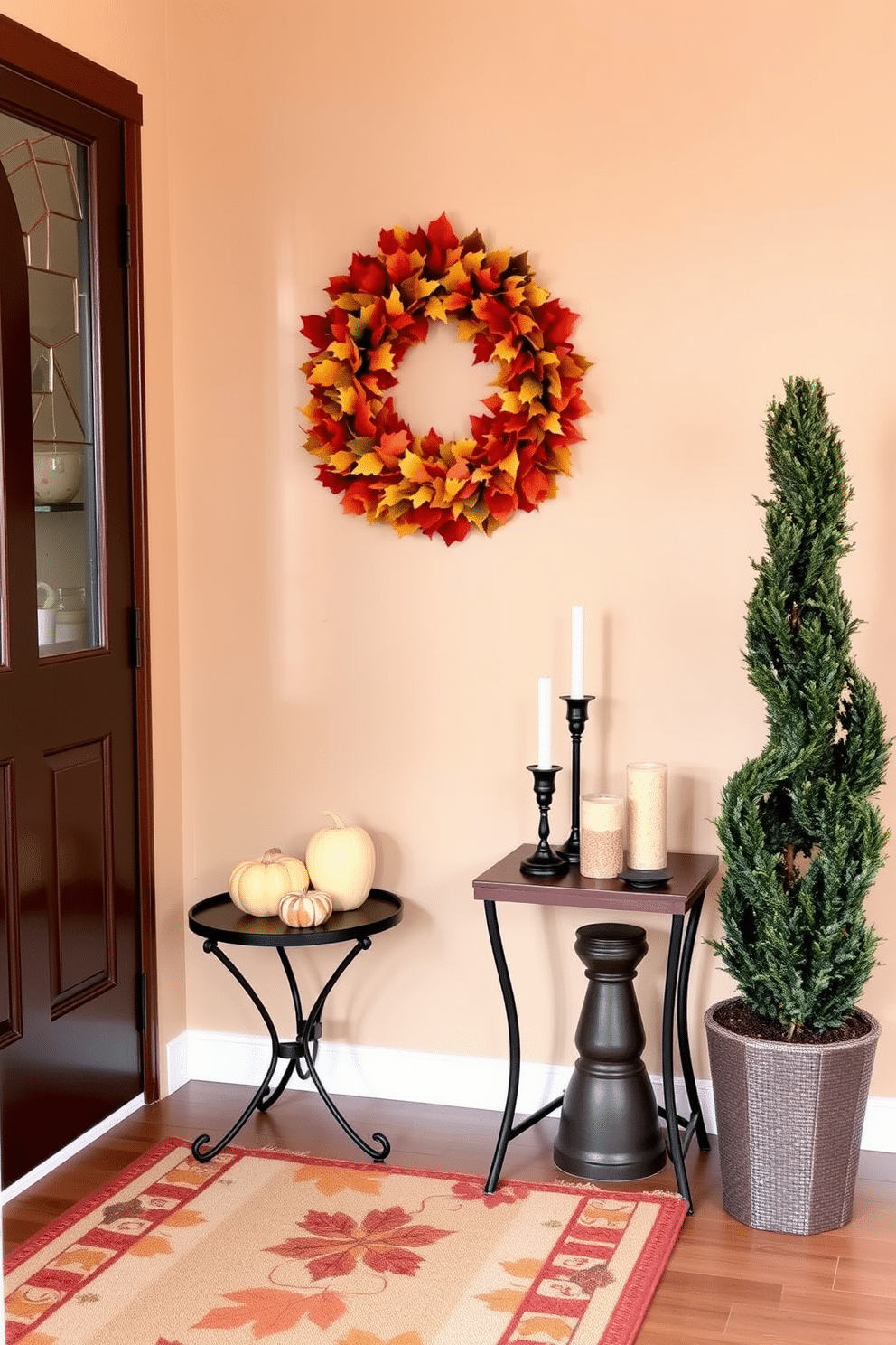 A stylish entryway adorned with seasonal decor. A vibrant wreath made of autumn leaves hangs on the door, while a small table beside it displays a collection of pumpkins and candles. The walls are painted in a warm beige tone, complemented by a runner rug featuring earthy colors. A tall potted plant stands in the corner, adding a touch of greenery to the space.