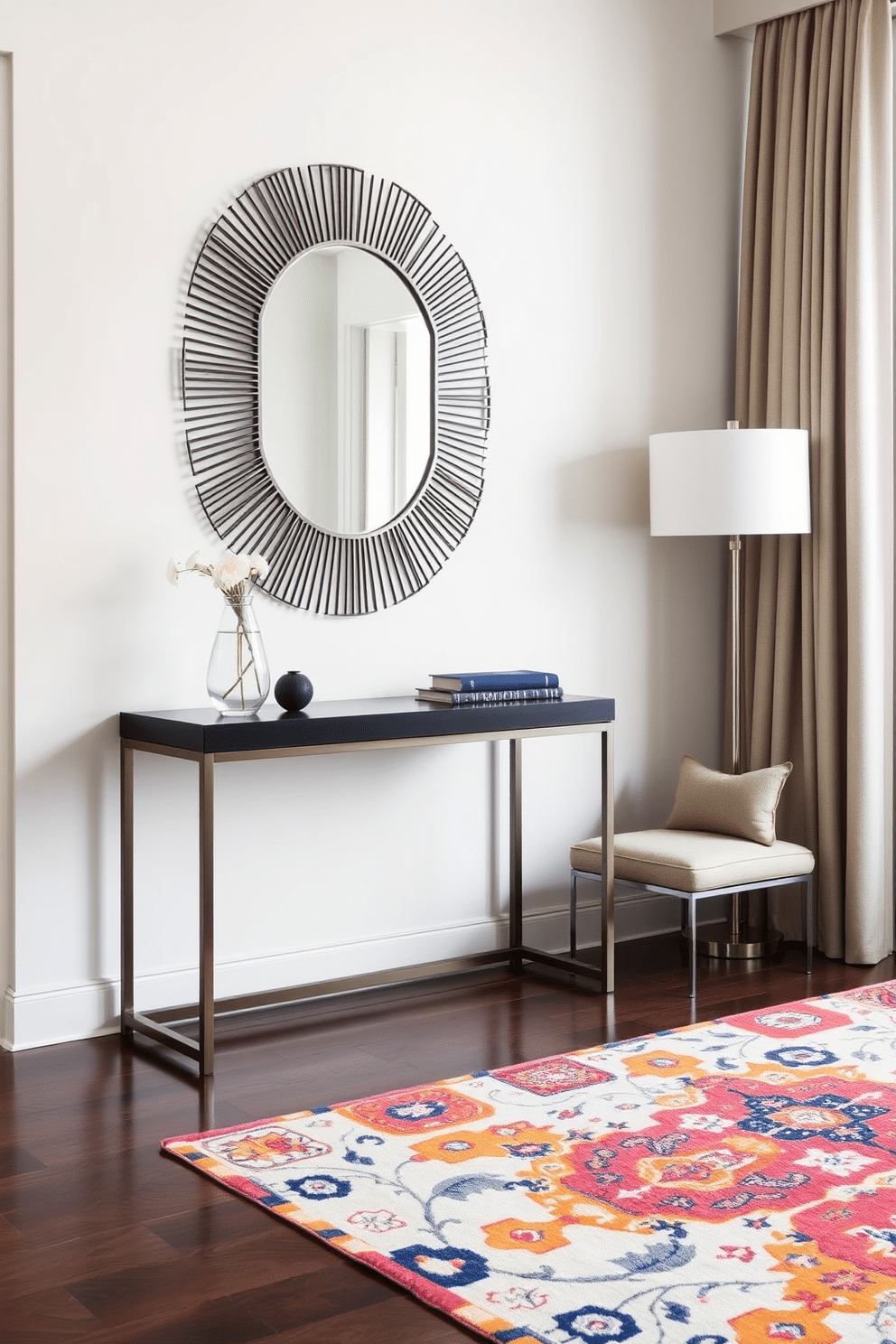 A stylish condo entryway featuring a sleek console table with a minimalist design, adorned with a decorative mirror above it. To the side, a small upholstered bench provides seating, complemented by a vibrant area rug that adds warmth to the space.