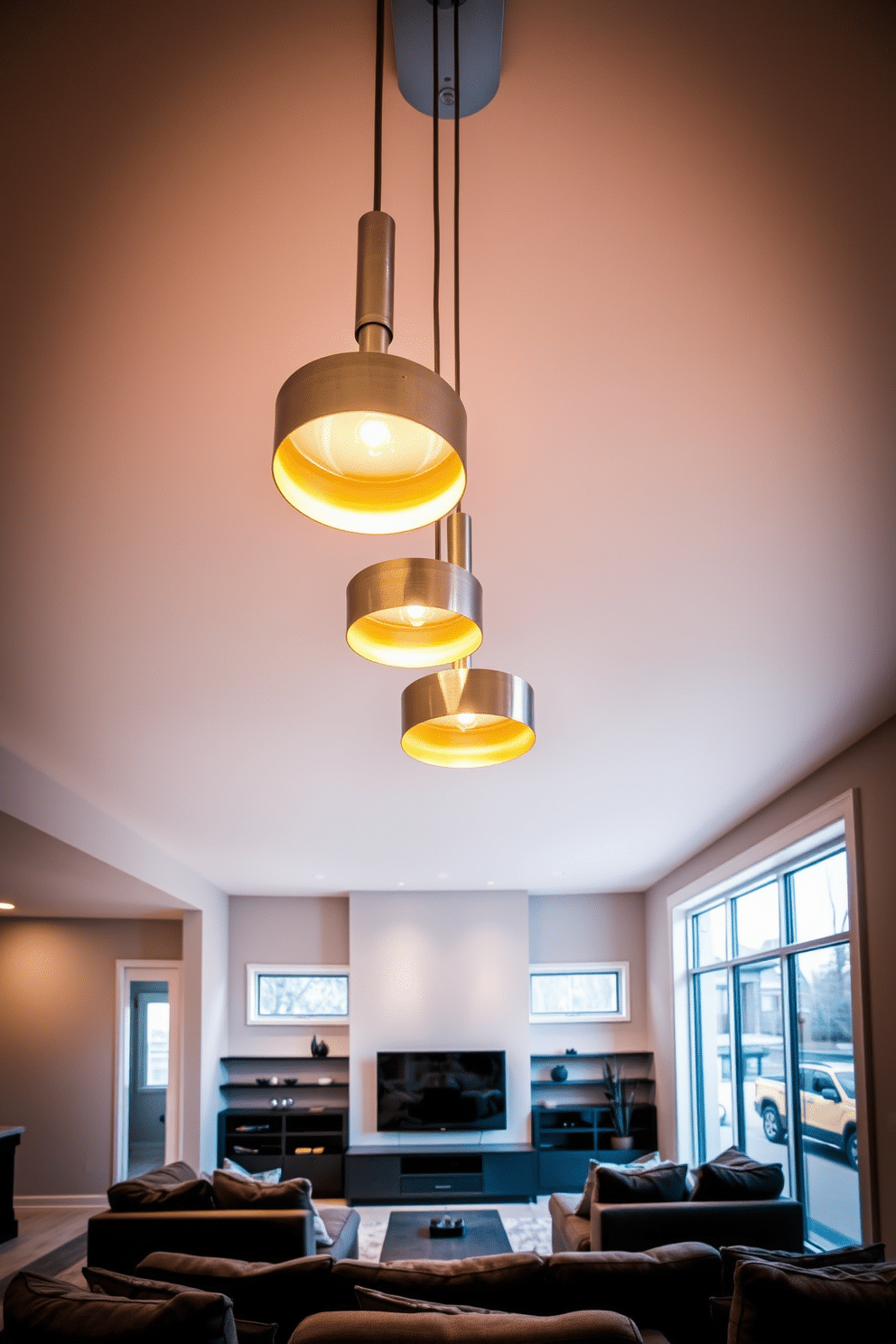 A set of sleek contemporary pendant lights hangs gracefully from the ceiling, featuring a minimalist design with metallic finishes that catch the eye. The warm glow of the lights creates an inviting atmosphere, perfect for entertaining or relaxing in style. The contemporary basement design showcases an open layout with plush seating and a modern entertainment center, seamlessly blending comfort and sophistication. Large windows allow natural light to flood the space, while a neutral color palette enhances the feeling of spaciousness and tranquility.