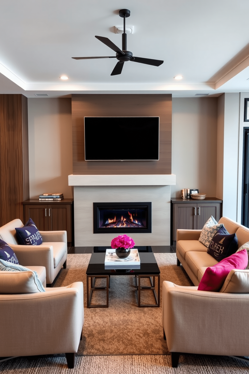 A contemporary game room featuring a sleek design with a smart TV mounted above a modern fireplace. The room is adorned with plush seating in neutral tones, complemented by vibrant accent pillows and a stylish coffee table at the center.