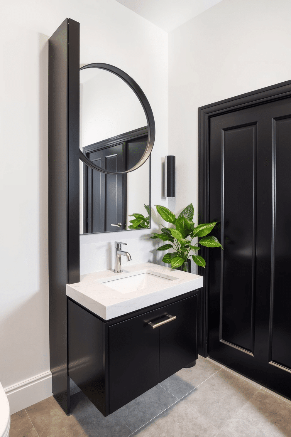 A contemporary powder room featuring a sleek black vanity with a white marble top, complemented by a stylish chrome faucet. The walls are painted in a soft white, creating a striking contrast with the dark cabinetry, while a large round mirror with a black frame enhances the space's modern aesthetic. The floor is adorned with large format gray tiles, providing a subtle backdrop that highlights the room's elegant fixtures. A vibrant green plant sits in the corner, adding a pop of color and a touch of nature to the sophisticated design.