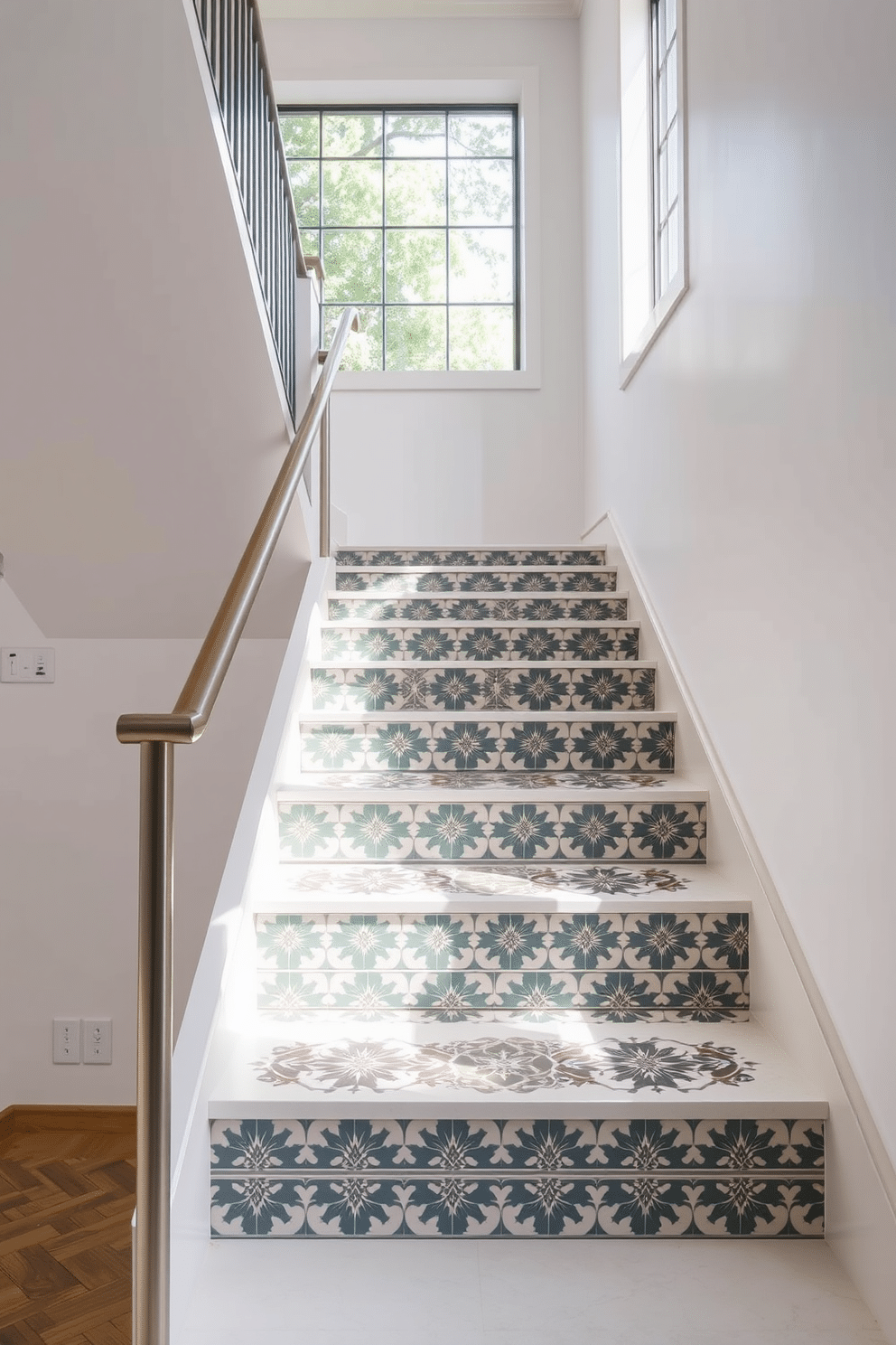 A contemporary staircase featuring patterned tile risers that add a vibrant touch to the overall design. The handrail is sleek and minimalistic, crafted from brushed metal, complementing the clean lines of the staircase. The surrounding walls are painted in a soft white, allowing the colorful tiles to stand out. Natural light floods the space through a large window, highlighting the intricate patterns of the risers and creating a welcoming atmosphere.