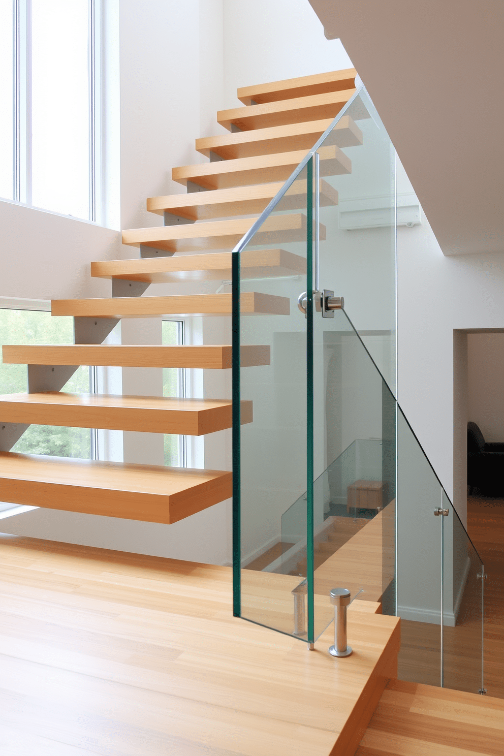 A modern staircase with suspended steps features sleek, minimalist lines and a floating design that creates an airy feel. The treads are made of polished wood, while the risers are open, allowing light to flow through and enhance the space. The handrail is crafted from tempered glass, providing safety without obstructing the view. Large windows beside the staircase flood the area with natural light, highlighting the elegant materials and clean aesthetic.