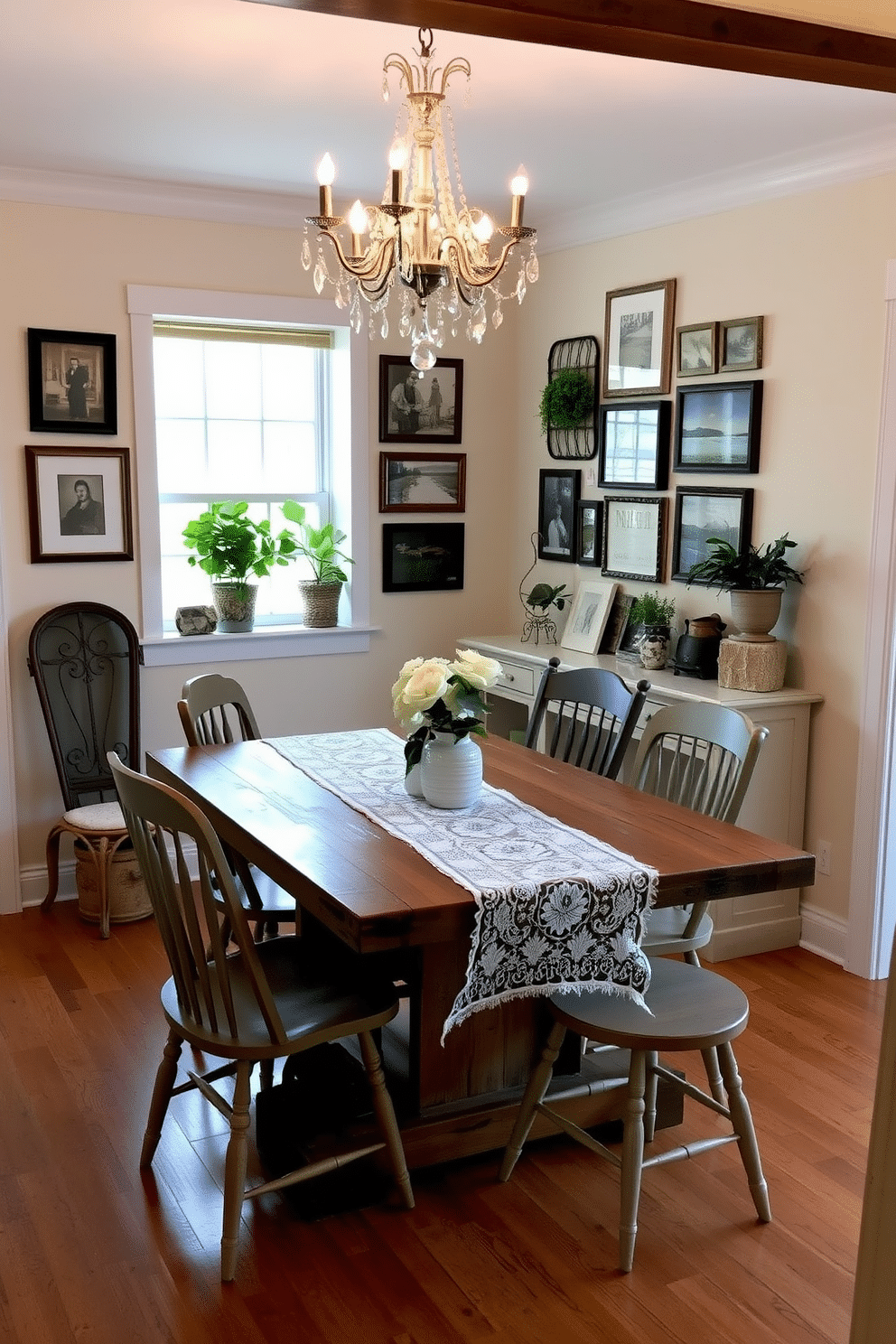 A rustic farmhouse table made of reclaimed wood sits at the center of a cozy dining room, surrounded by mismatched chairs that add character. Elegant accents, such as a crystal chandelier overhead and a vintage runner adorned with delicate lace, enhance the warm, inviting atmosphere. The walls are painted in a soft cream color, providing a perfect backdrop for eclectic decor pieces that reflect personal style. A gallery wall of framed art and family photos, combined with potted plants on the windowsill, creates a vibrant and lived-in feel.