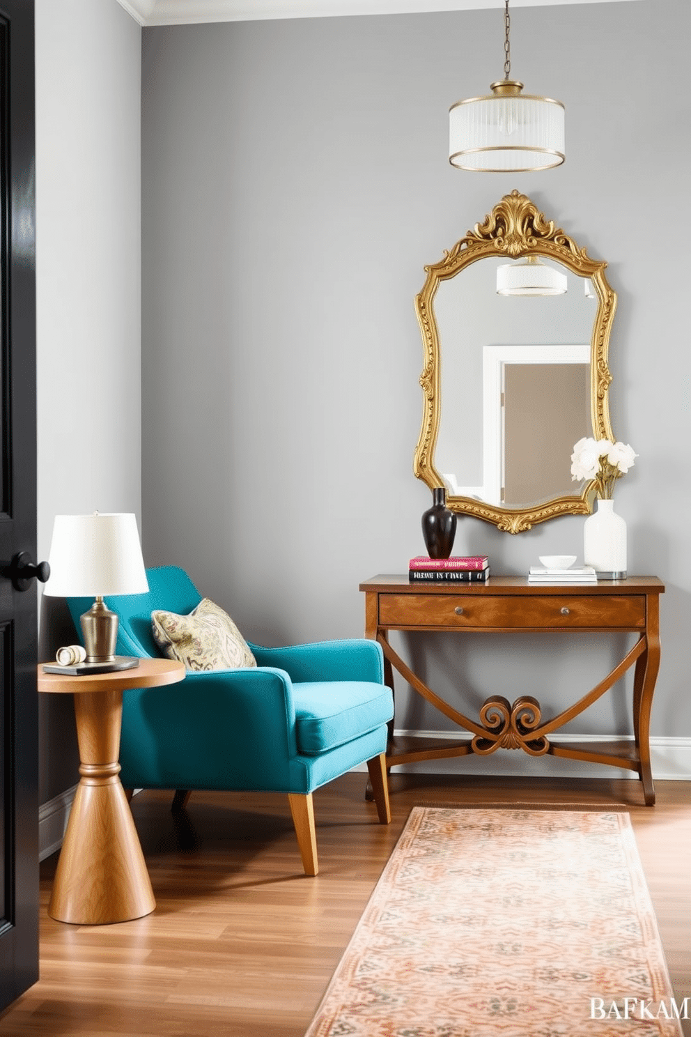 A colorful accent chair in a vibrant teal fabric sits in the corner of the entrance foyer, adding a playful pop of color to the space. The chair is paired with a small, round side table made of natural wood, adorned with a stylish lamp and a few decorative books. The entrance foyer features a striking console table against the wall, topped with a large mirror in an ornate gold frame. Soft lighting from a chic pendant light illuminates the area, while a patterned runner rug adds warmth and texture to the floor.