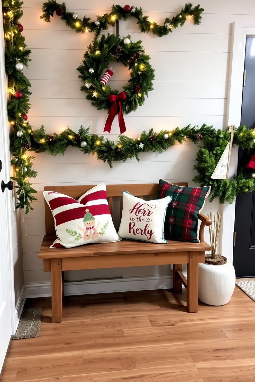 A cozy entryway adorned with holiday-themed throw pillows on a rustic wooden bench. The bench is placed against a wall decorated with festive garlands, twinkling lights, and a cheerful wreath, creating a warm and inviting atmosphere.