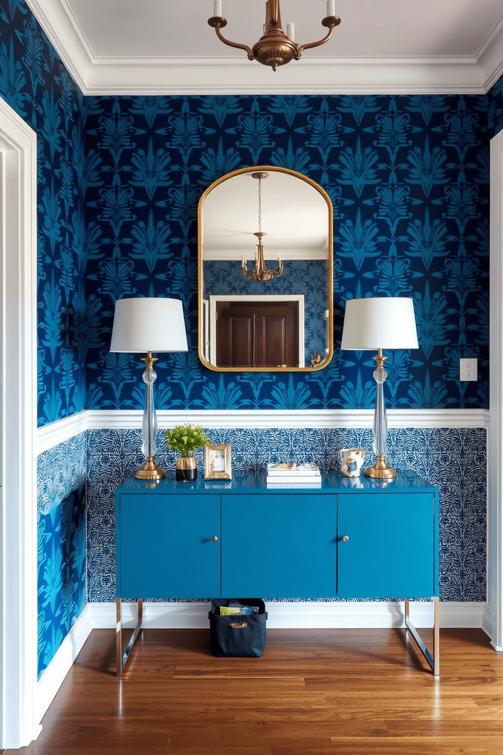 A striking entryway features bold, patterned wallpaper that instantly captivates guests as they enter. A sleek console table in a contrasting color sits against the wall, adorned with decorative items and a stylish mirror above it.